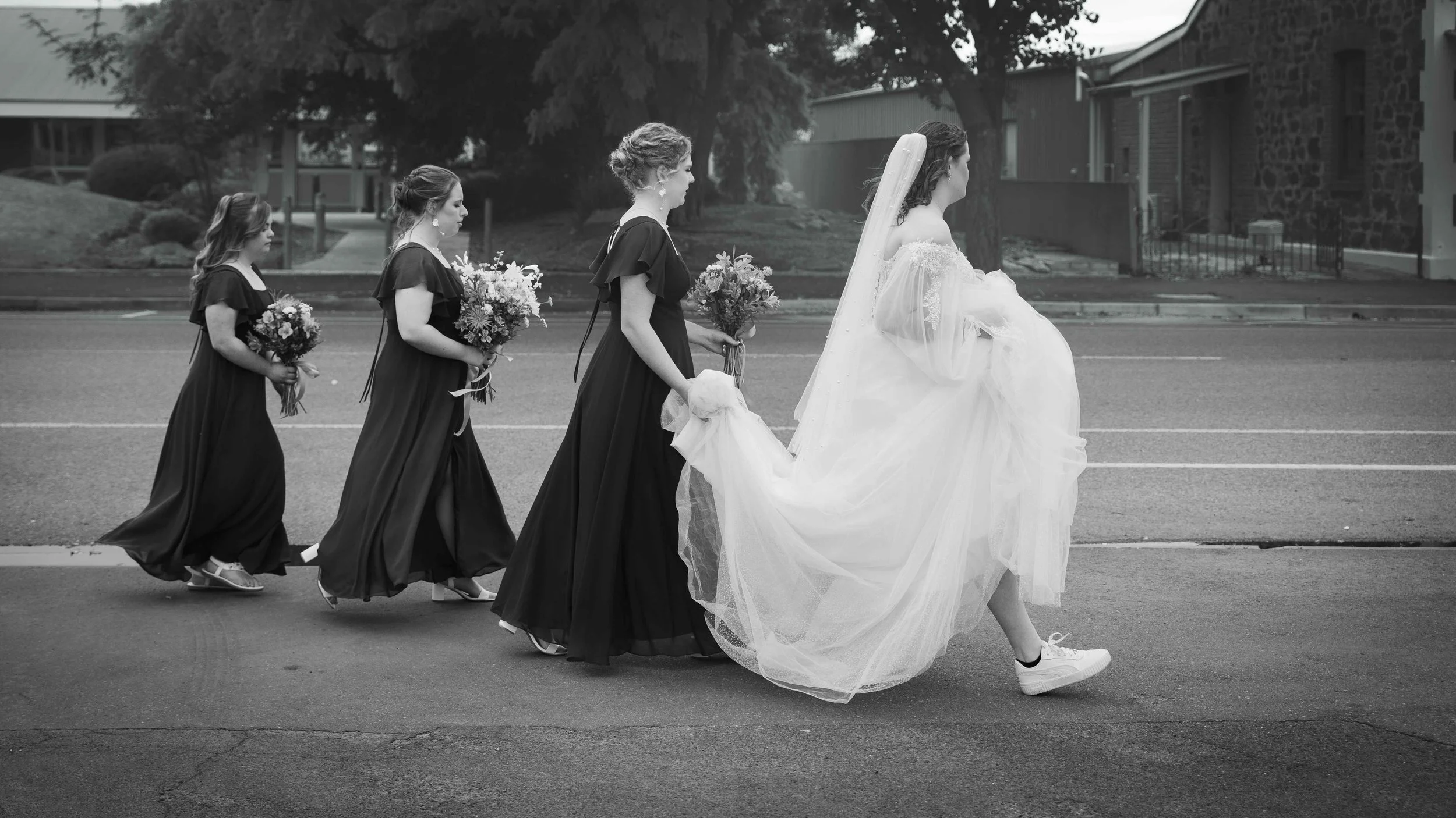 bride and bridesmaids street photography