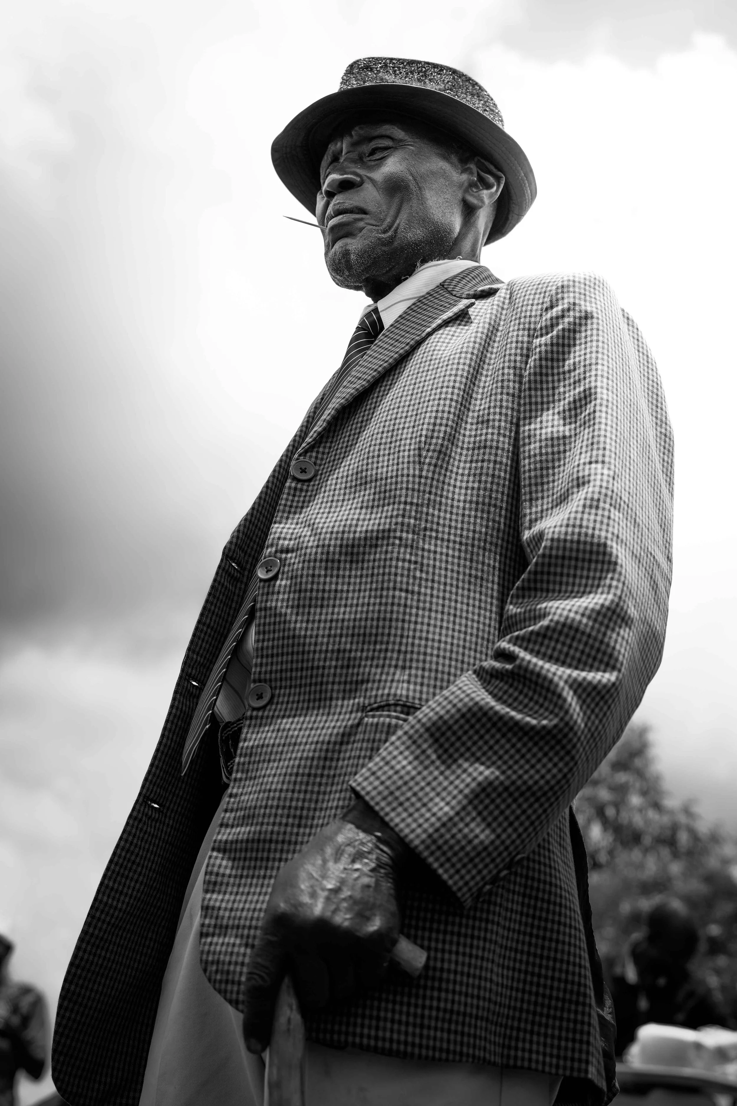 man with toothpick black and white Kenya