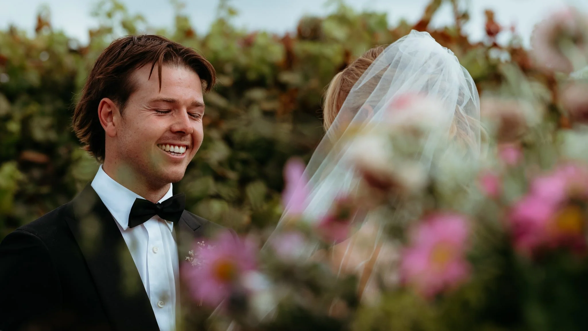 Adelaide hills wedding photographer flowers happy groom