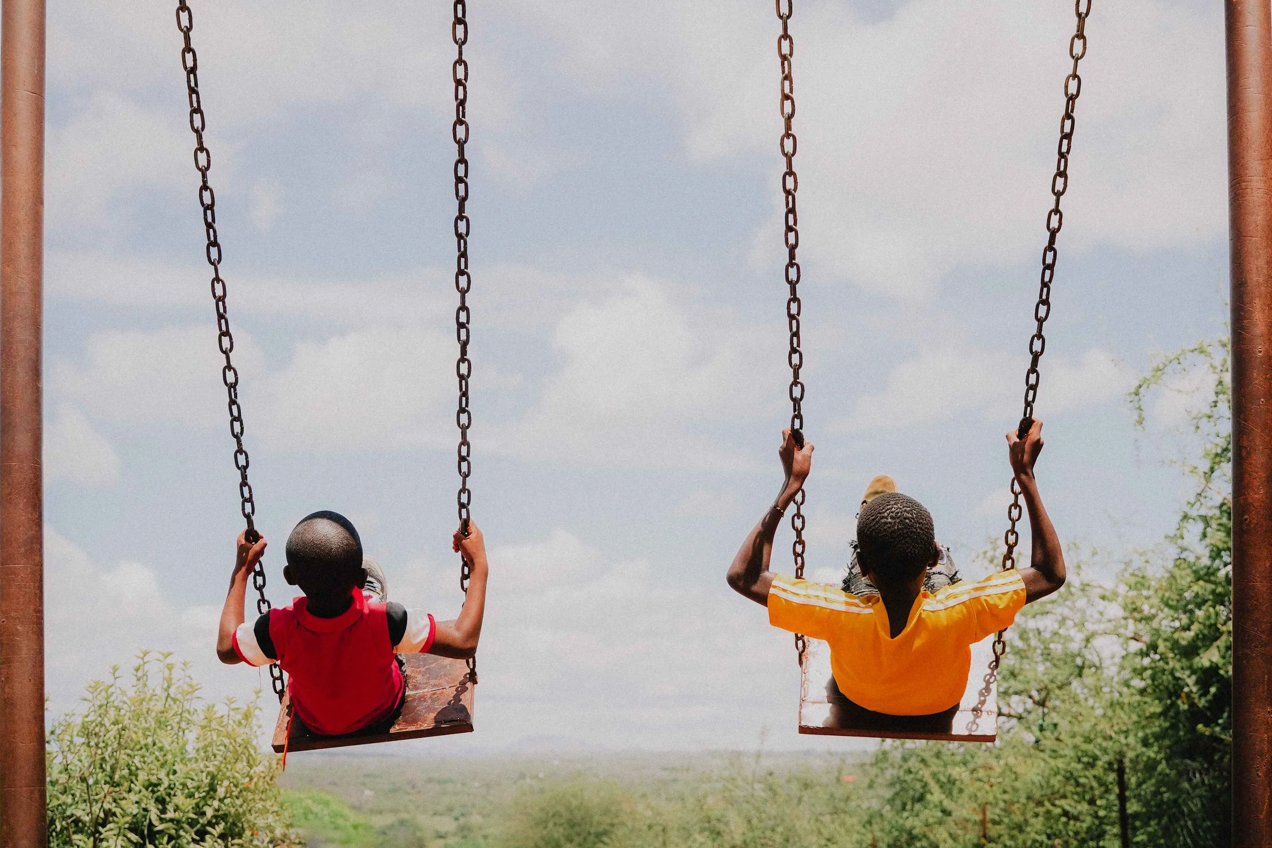kids on swing Kenya