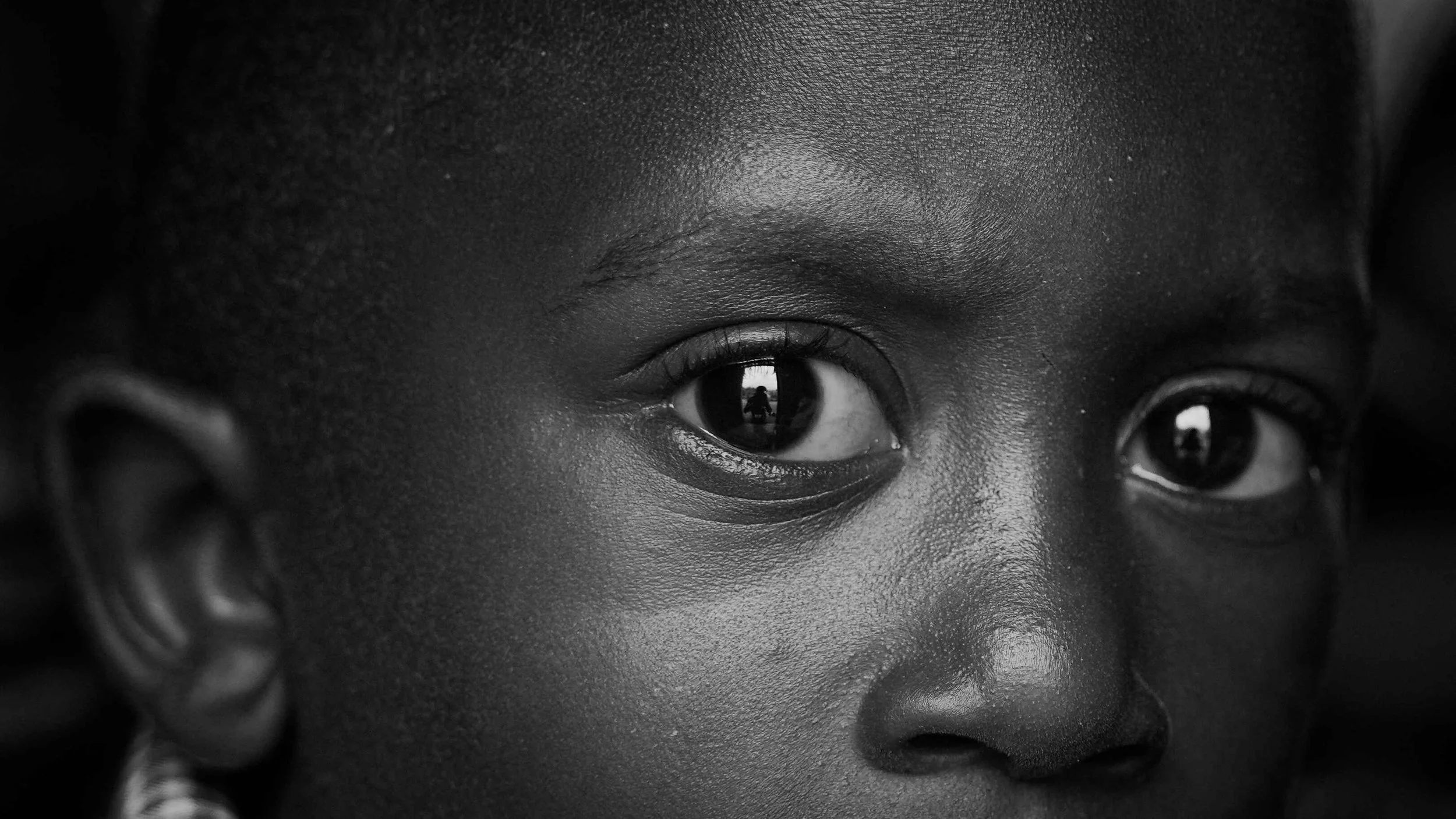 small boy eye reflection Kenya