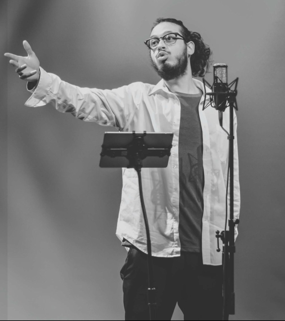 Spoken word performer participating in Fatherhood Monologues through The Manhood Tree exploring fatherhood, masculinity, and personal storytelling.