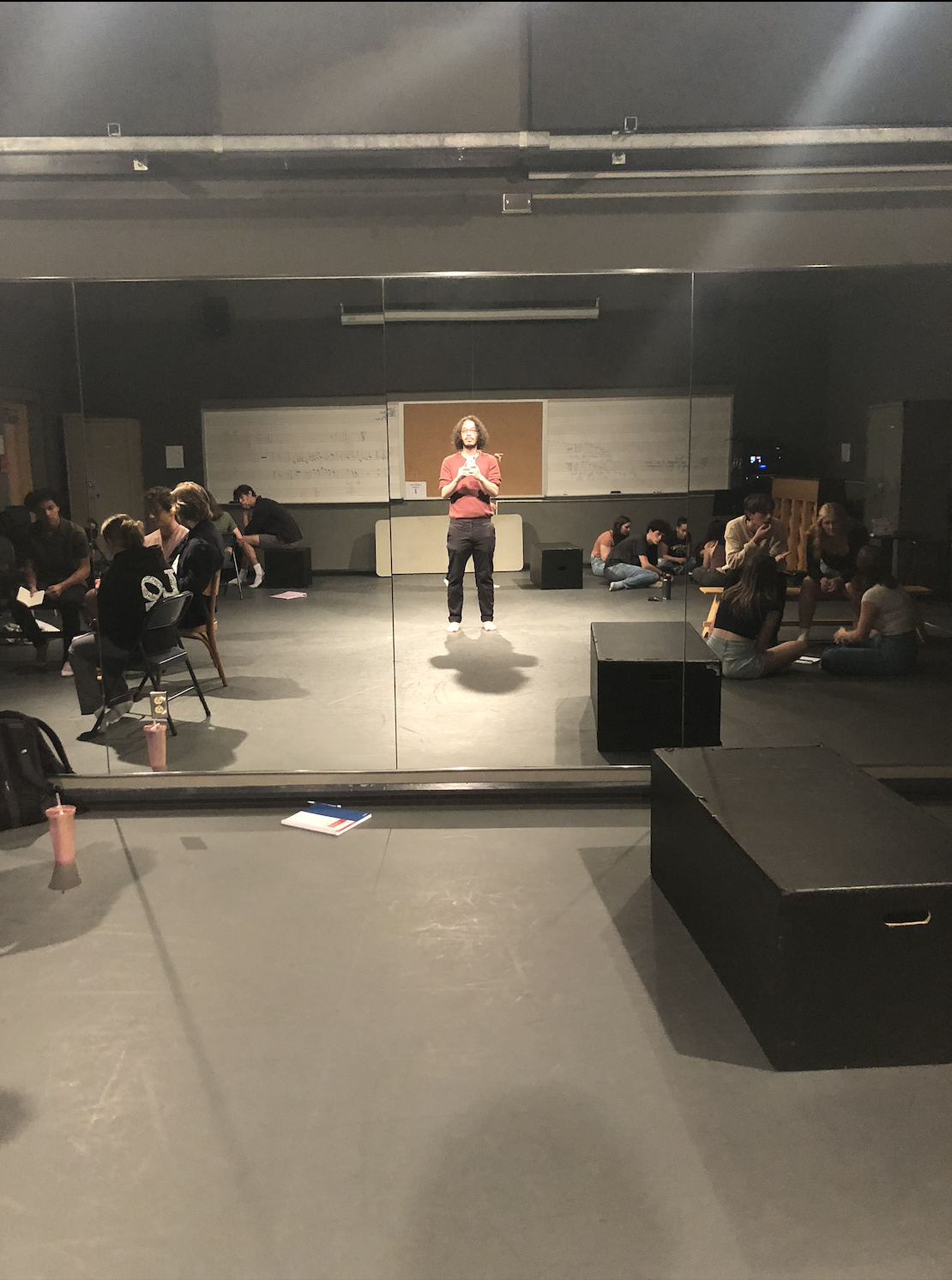 Spoken word poetry workshop facilitator leading youth storytelling and performance development through theater and creative writing programs.