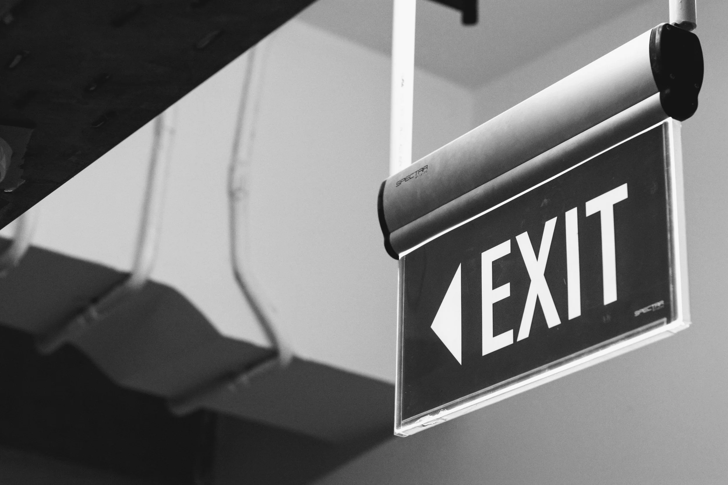 Exit and emergency lighting compliance and scheduled safety checks according to Australian standards.