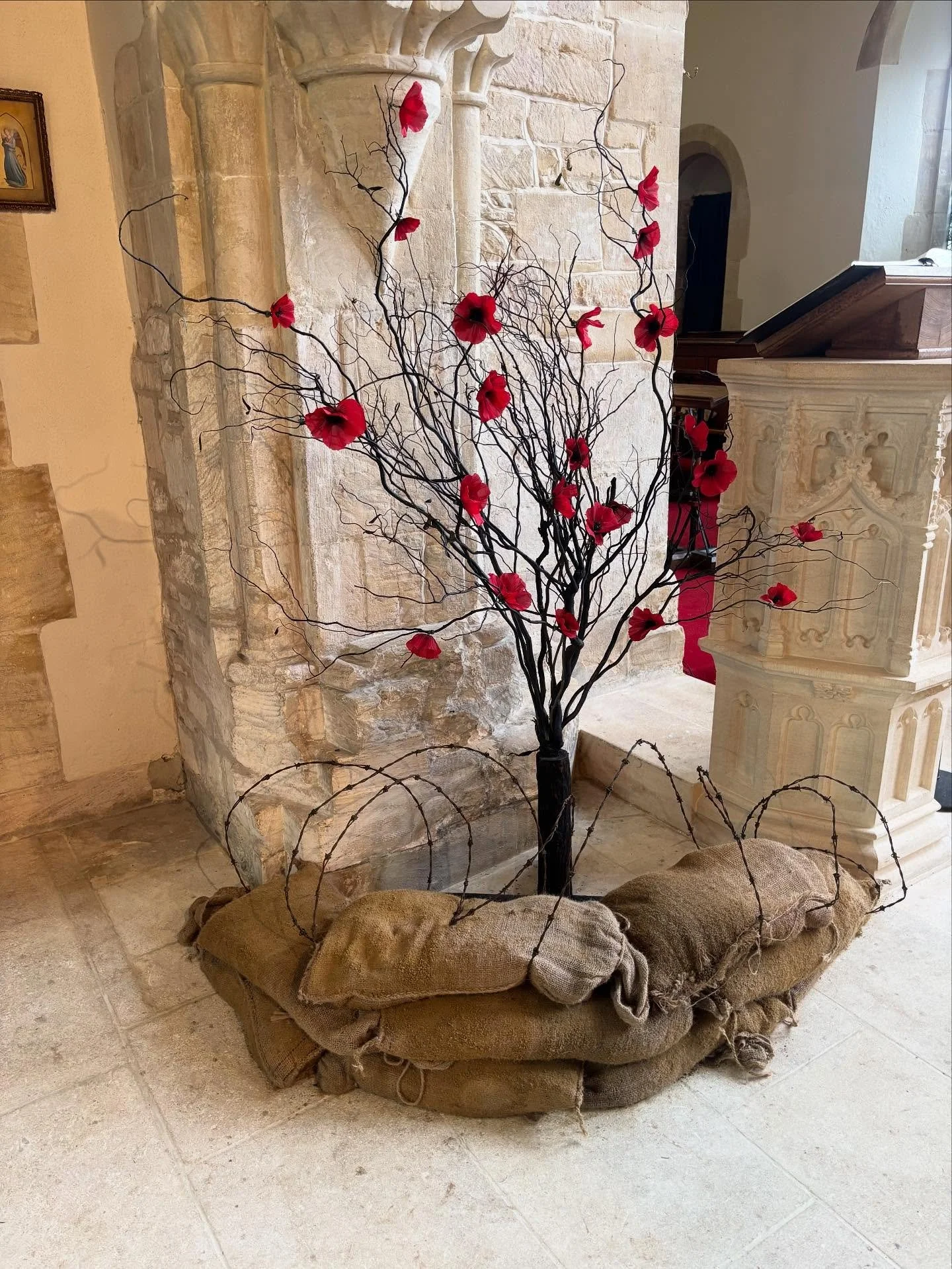 A somber reminder in our church this morning #lestweforget