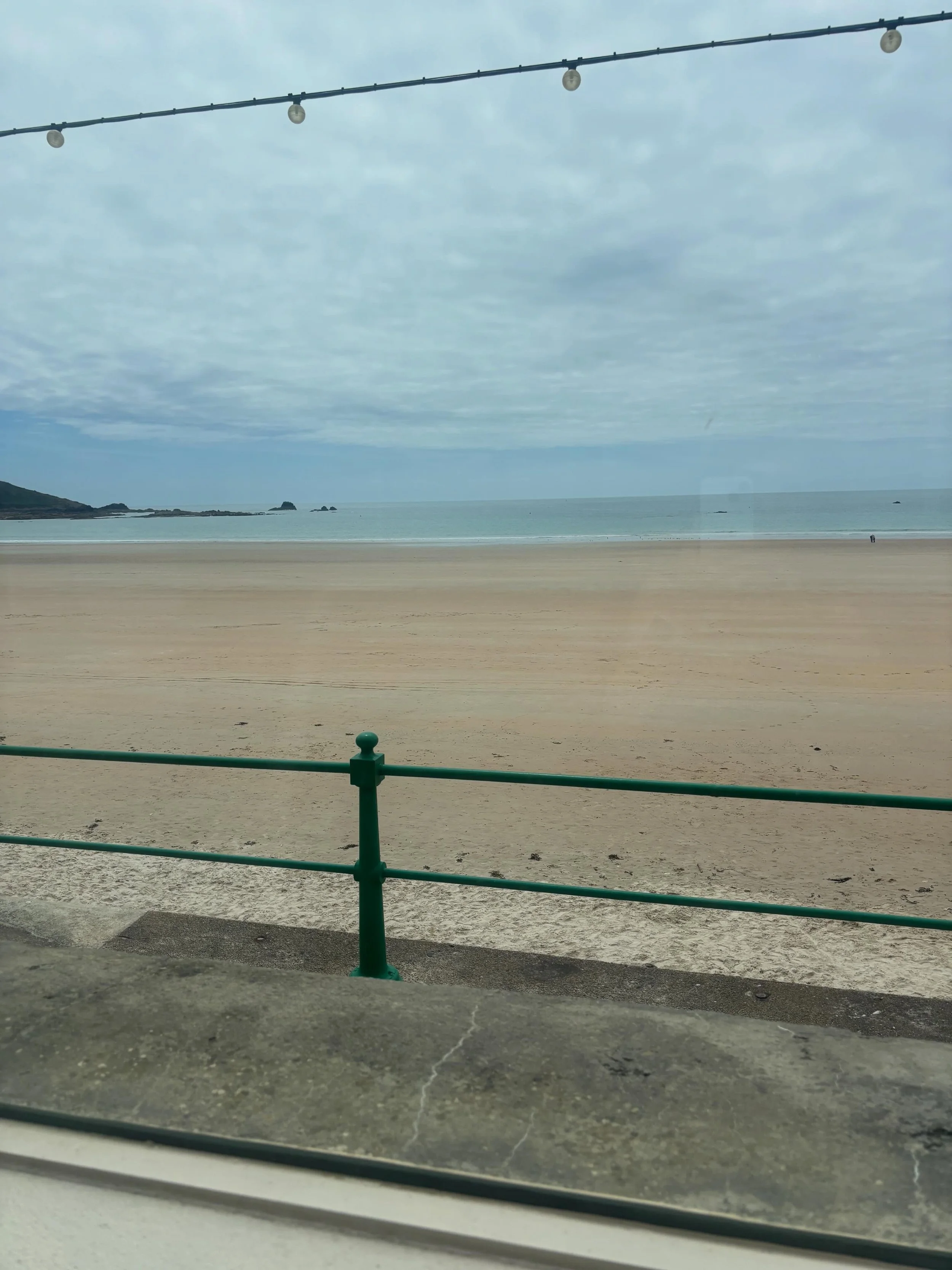 The view from my office today! Delighted to be working with @dementia_jersey launching their new initiative with @scanmicode. Enjoying a quick bite of lunch by the seaside before heading back to @itvnews in St Helier