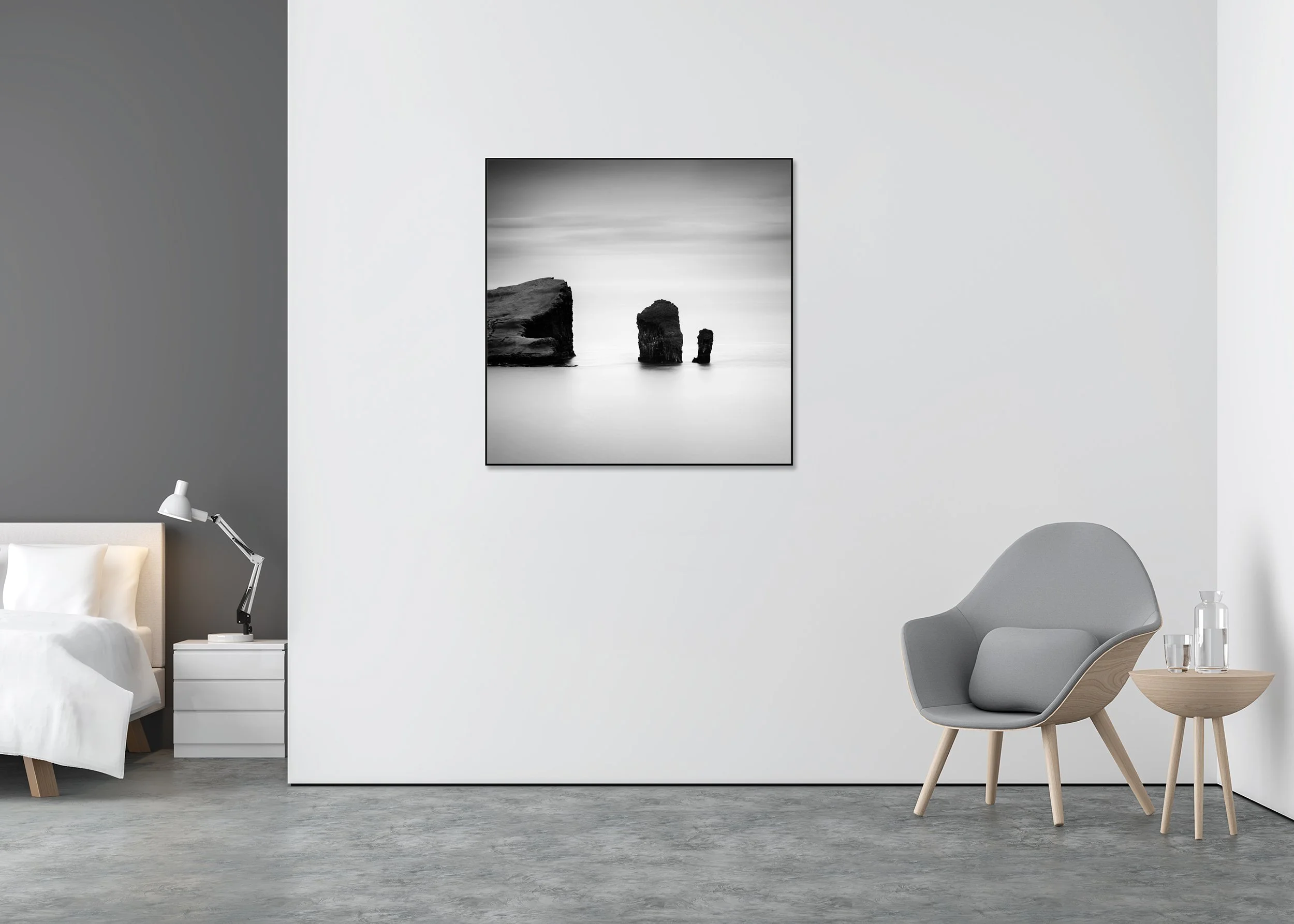 Minimalist black and white photo print of rock formations in calm sea water, Faroe Islands, mounted to Dibond in an aluminium ArtBox.