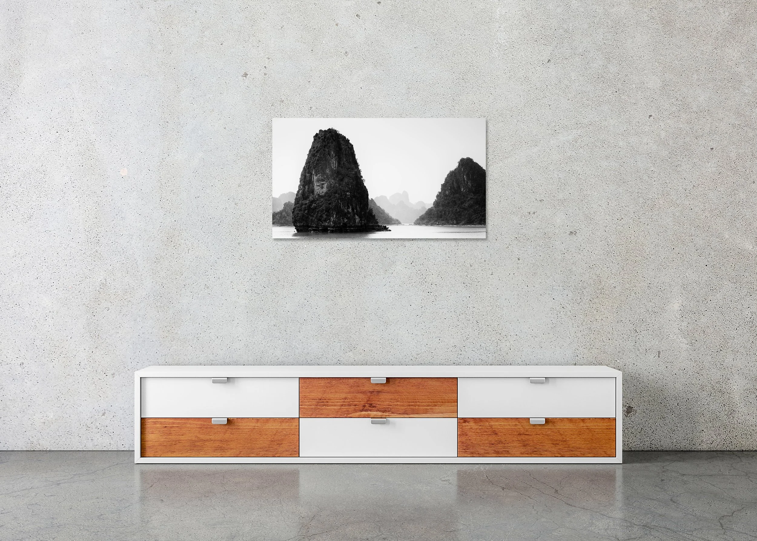 Ha Long Bay Panorama, Study 1 displayed in a modern interior as a frameless black-and-white aluminium Dibond print by Gerald Berghammer.