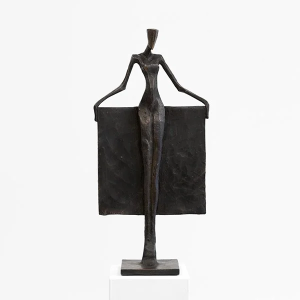 Neile by Nando Kallweit, limited-edition figurative bronze sculpture of an elongated female form with a slender geometric silhouette.