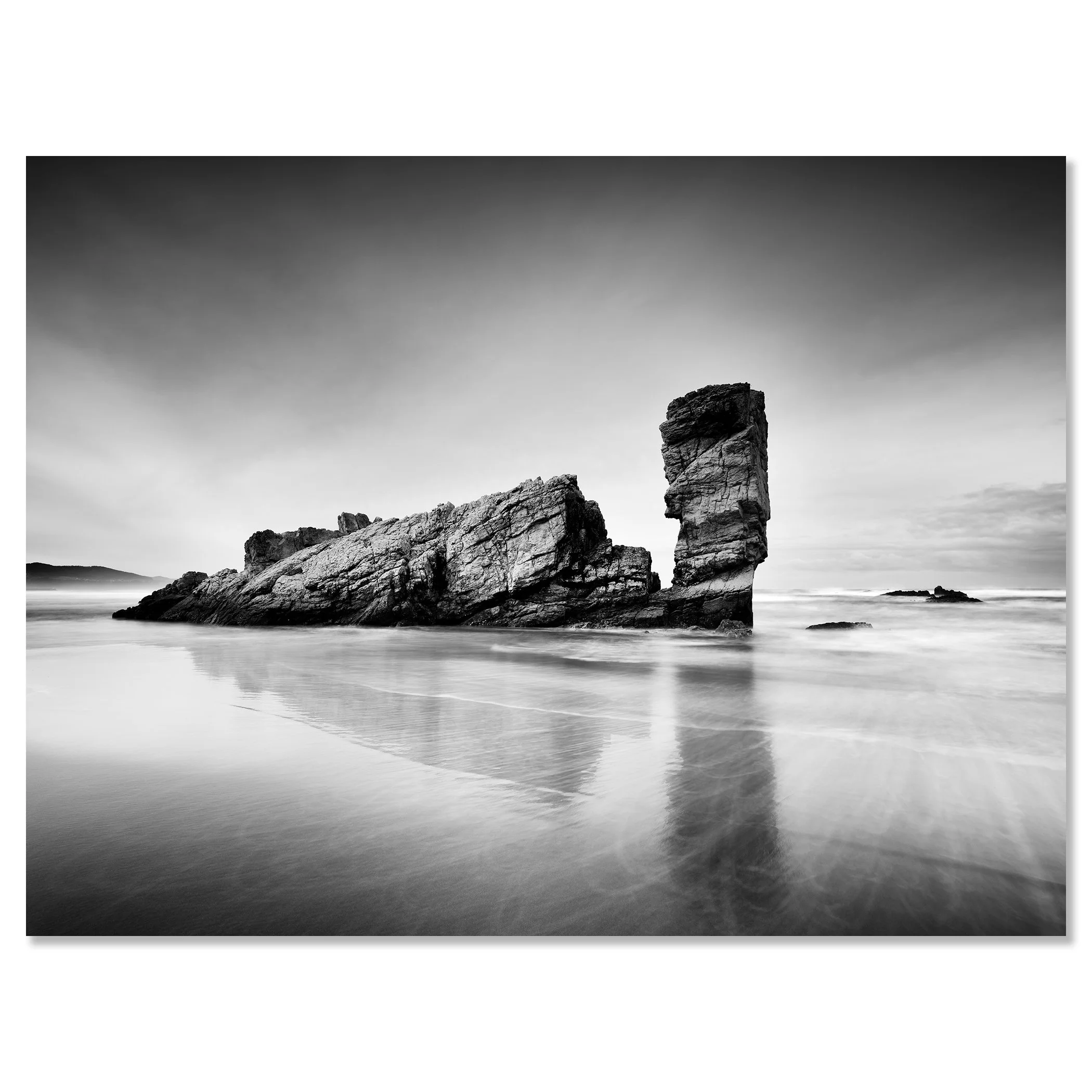 Black-and-white coastal rock formation reflected on wet sand at low tide – dibond frameless