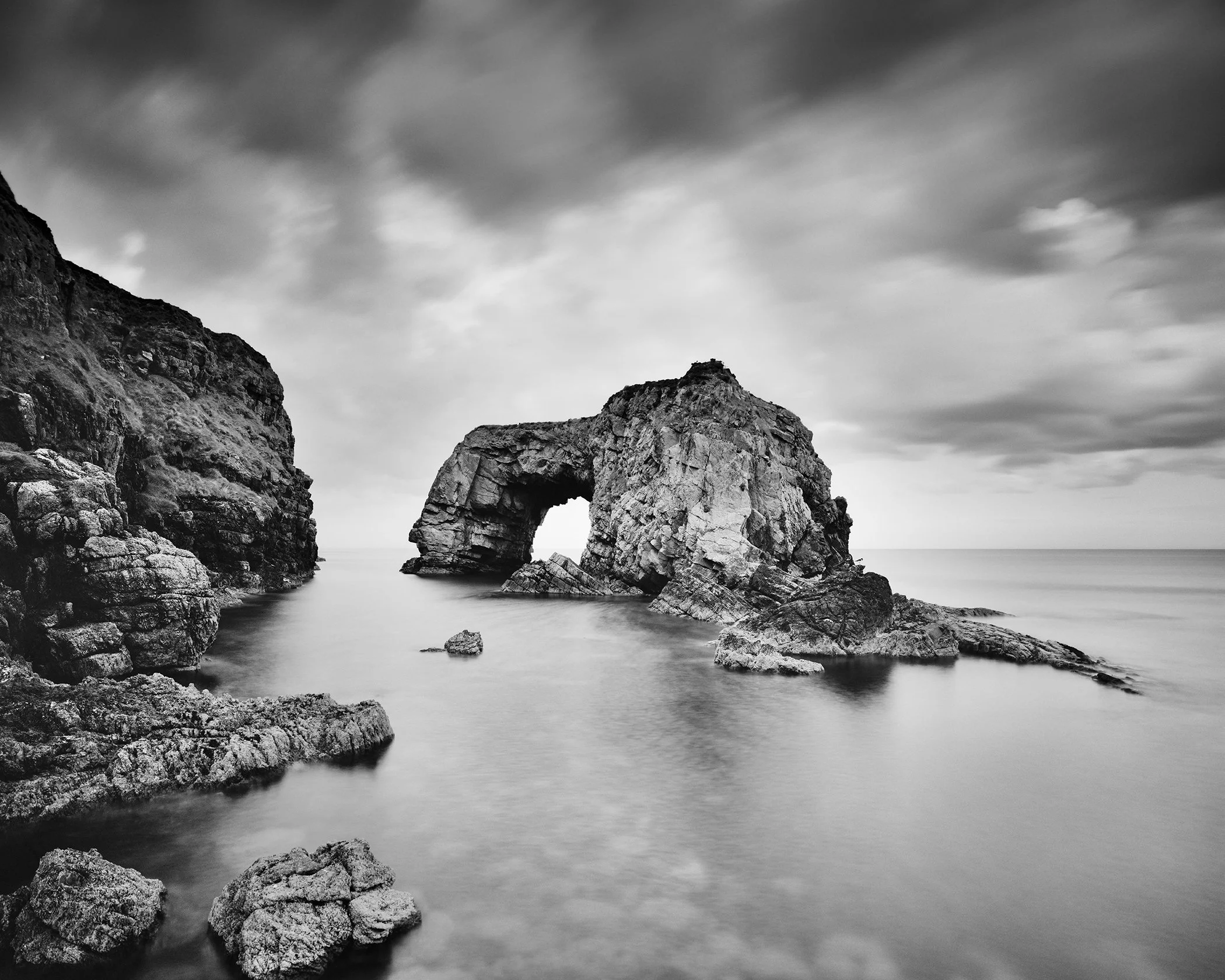 Great Pollet Sea Arch Study 3, black-and-white long-exposure seascape on the Fanad Peninsula in County Donegal, Ireland, by Gerald Berghammer.