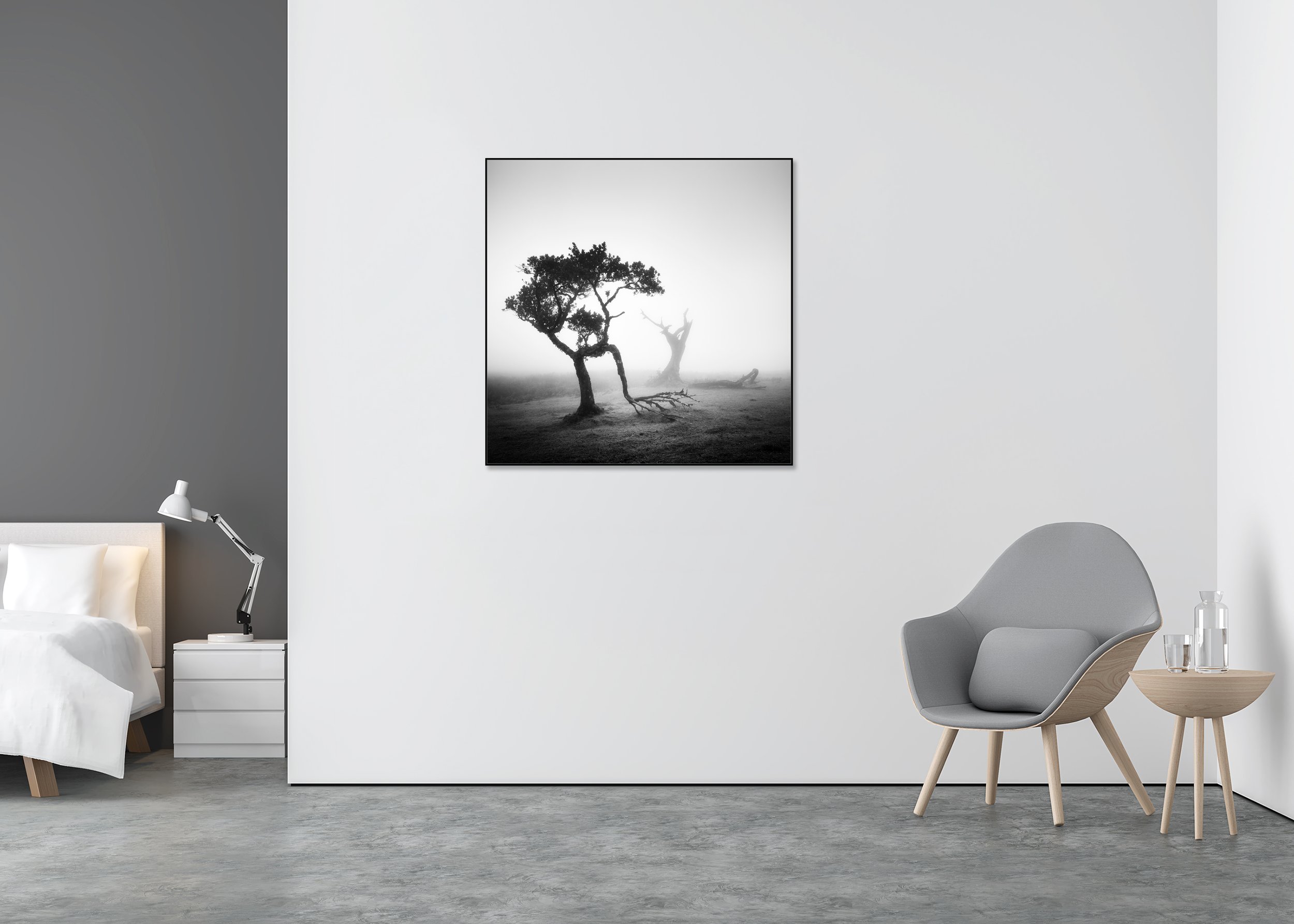 Atmospheric monochrome landscape on Madeira with two leafless trees in dense mist, one angled and partially collapsed, shown as a ChromaLuxe metal print in an Aluminium ArtBox.