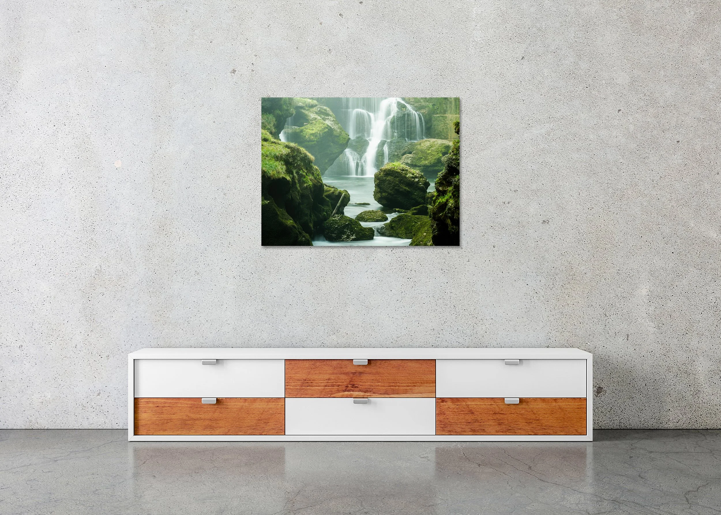 Moss-Covered Waterfall Study 1 displayed in a modern interior as a frameless colour artwork mounted on aluminium Dibond by Gerald Berghammer.
