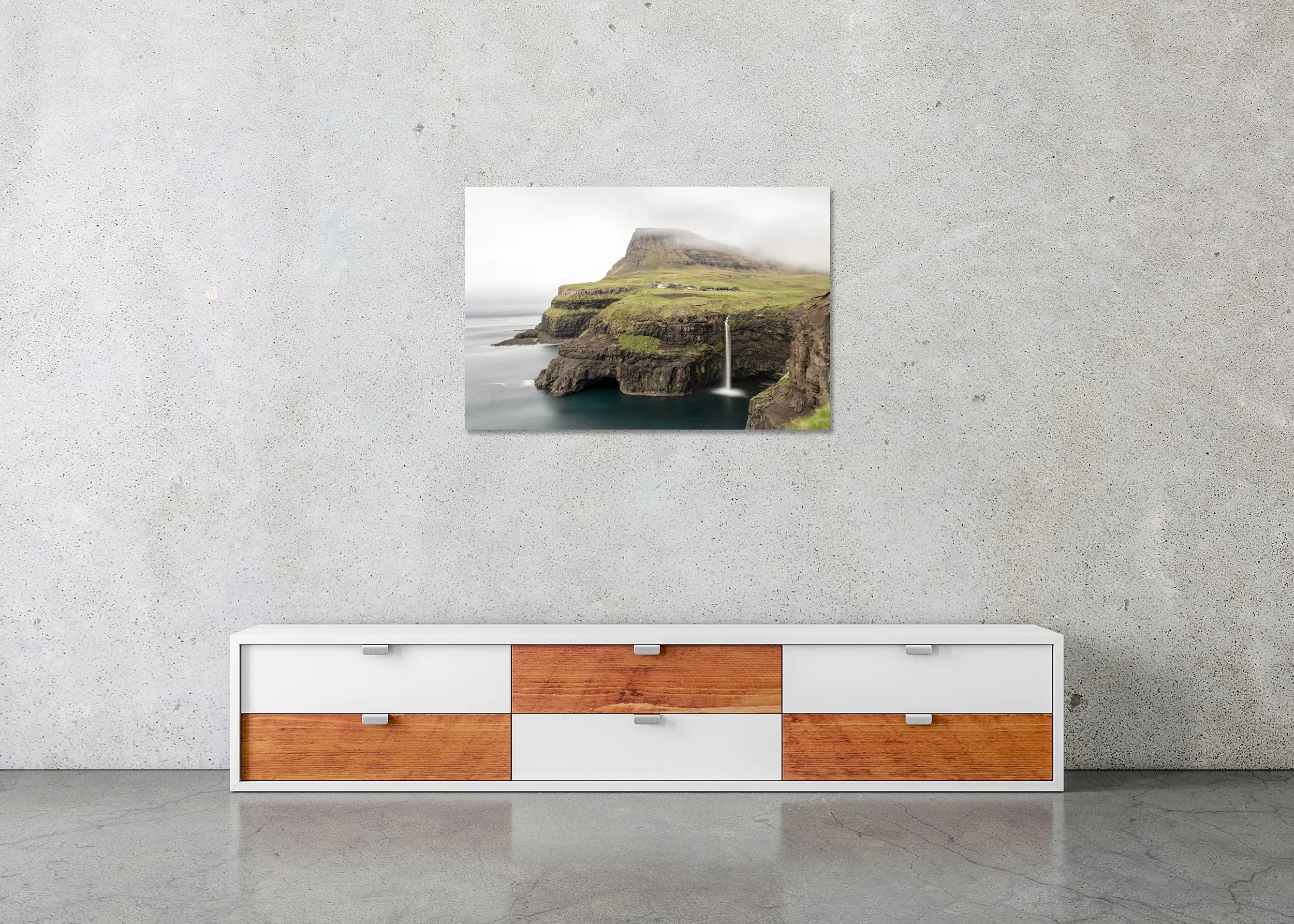 Múlafossur Waterfall Study 1 displayed in a modern interior as a frameless colour artwork mounted on aluminium Dibond by Gerald Berghammer.