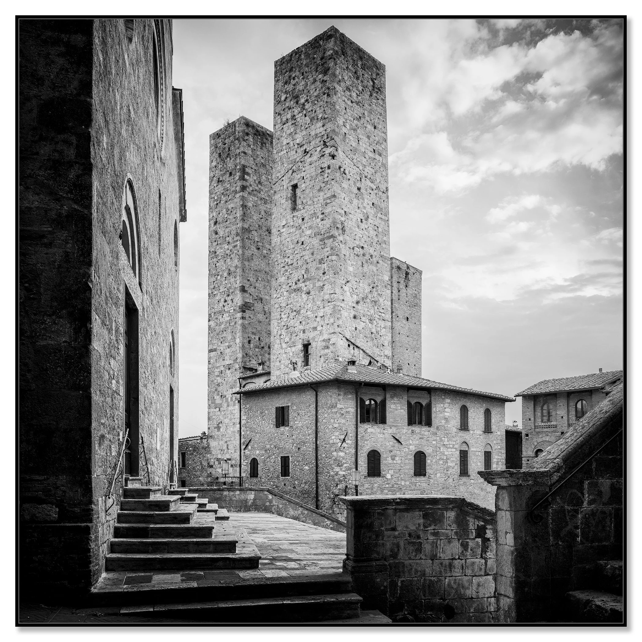 Black-and-white view of medieval stone towers and historic buildings in San Gimignano, Italy – framed ArtBox black