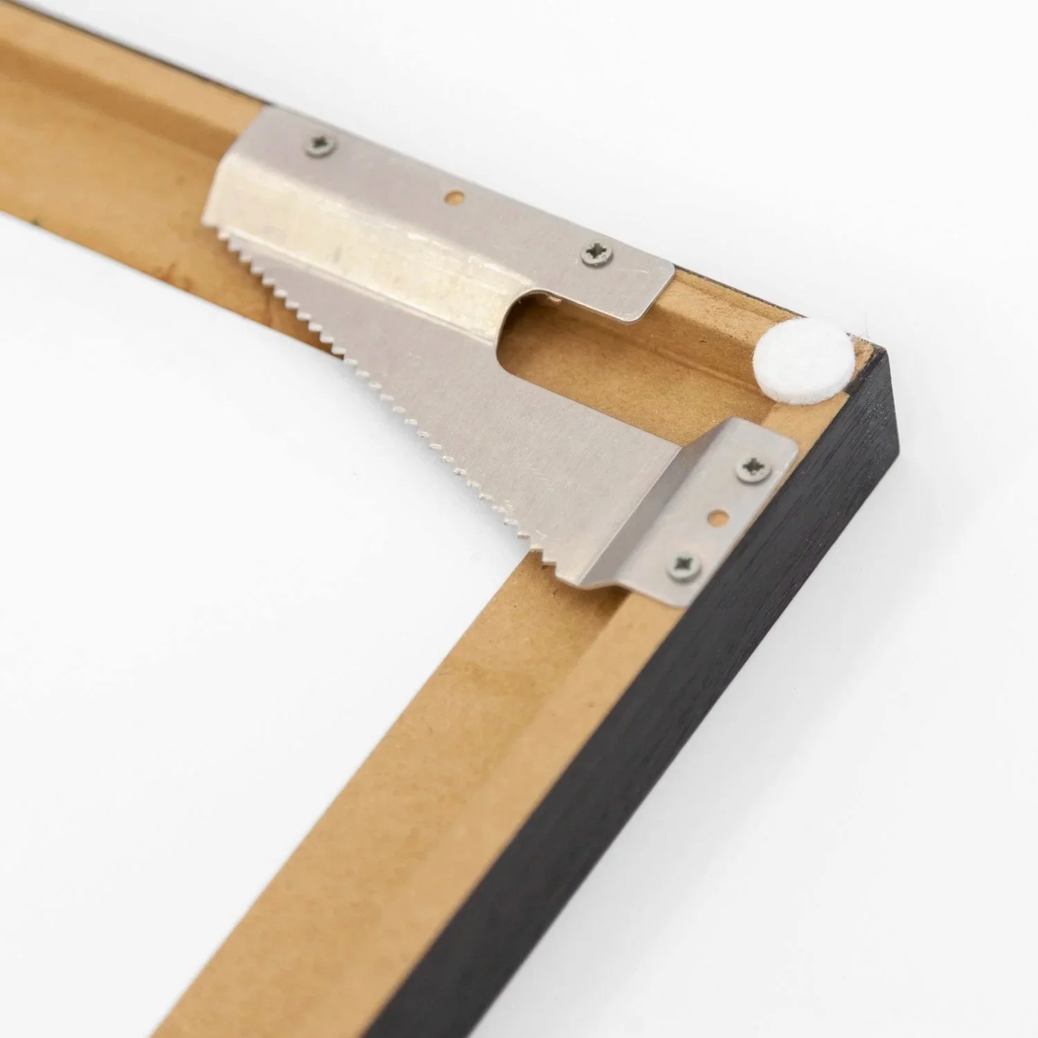 Close-up of the reverse of Gerald Berghammer's handmade wooden frame, showing the metal hanging fitting.
