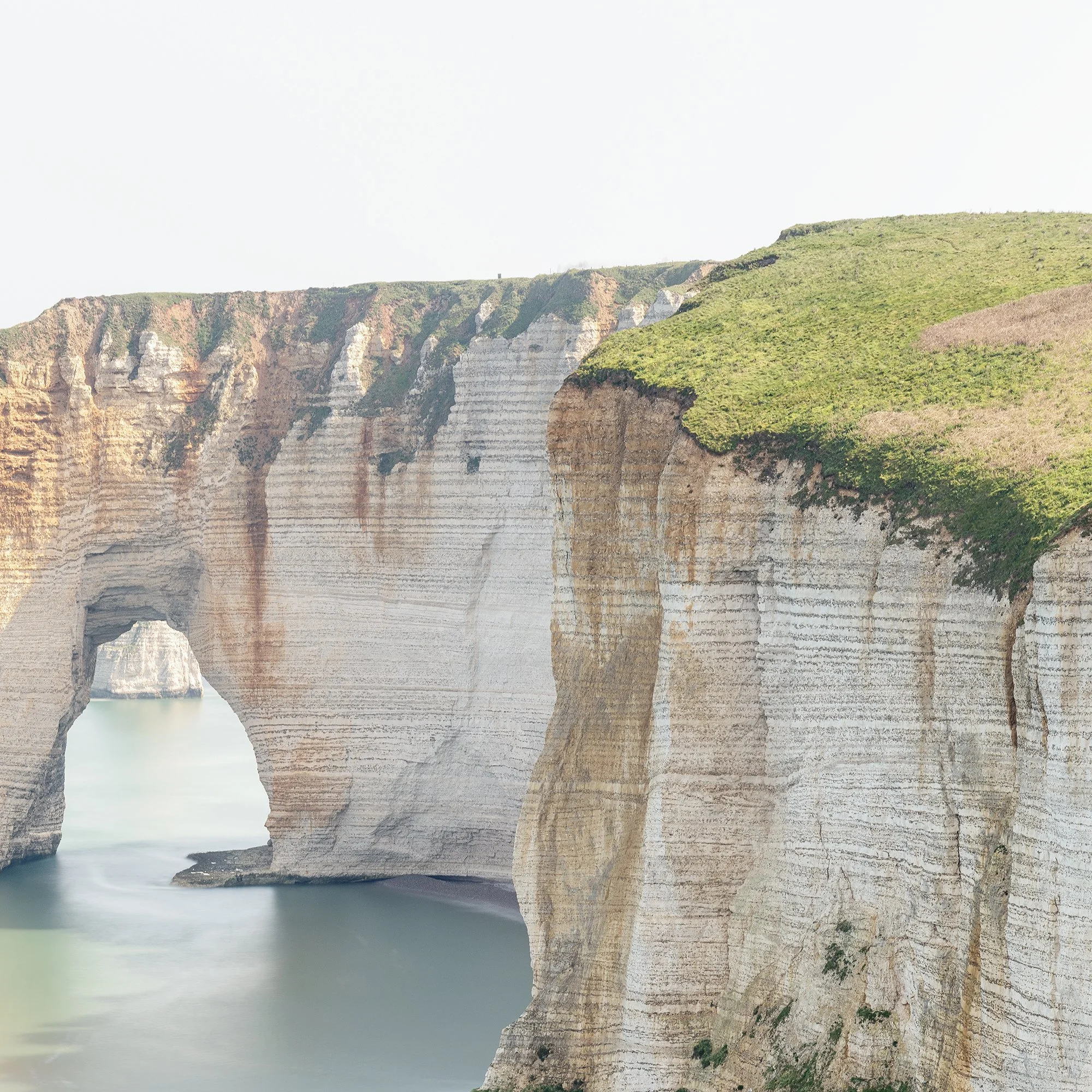 Cropped detail of Alabaster Coast, Study 3, showing the natural sea arch and limestone cliffs.