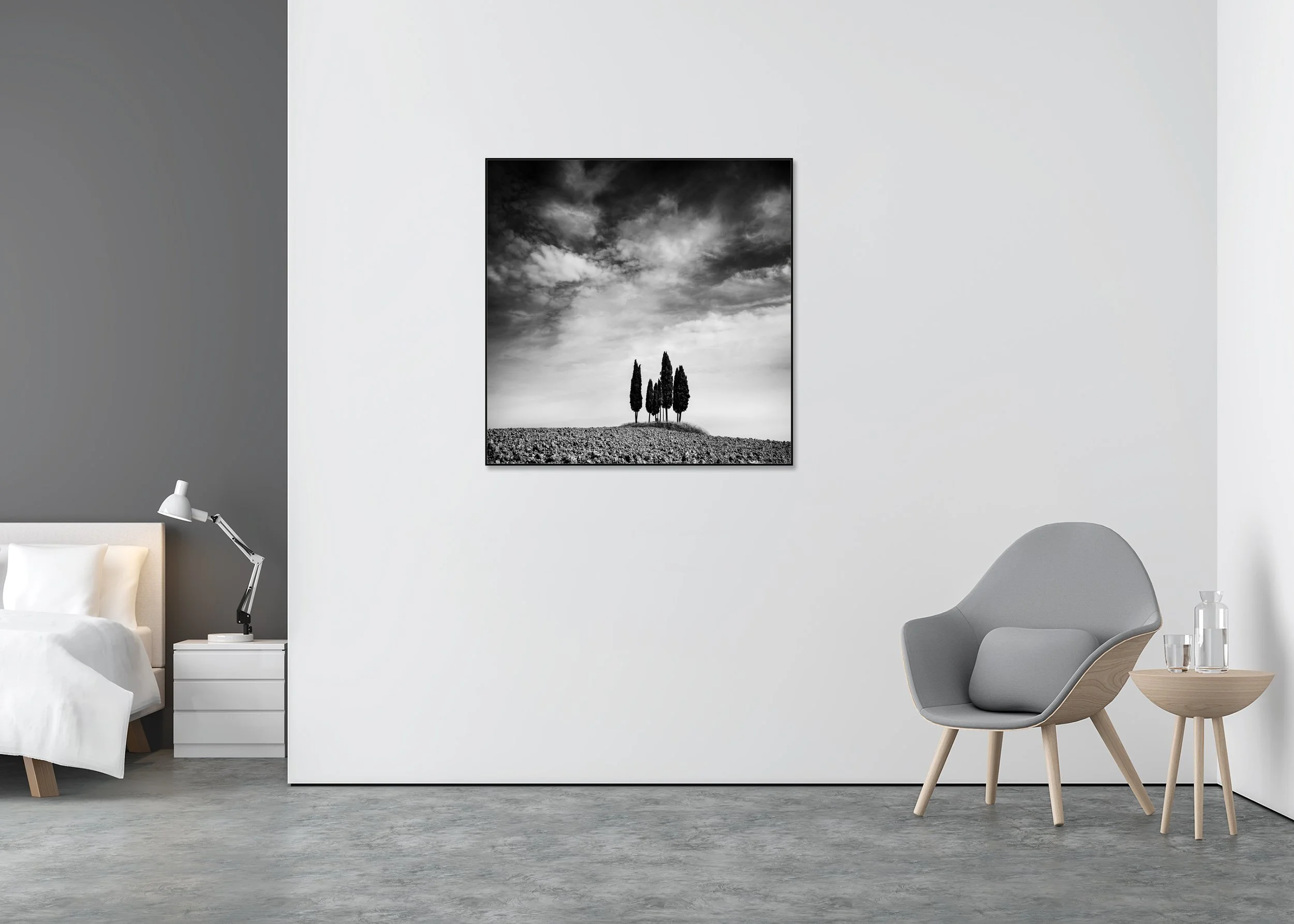 Minimalist monochrome landscape print with slender trees on a hilltop below a dramatic sky, mounted on Dibond in an aluminium ArtBox