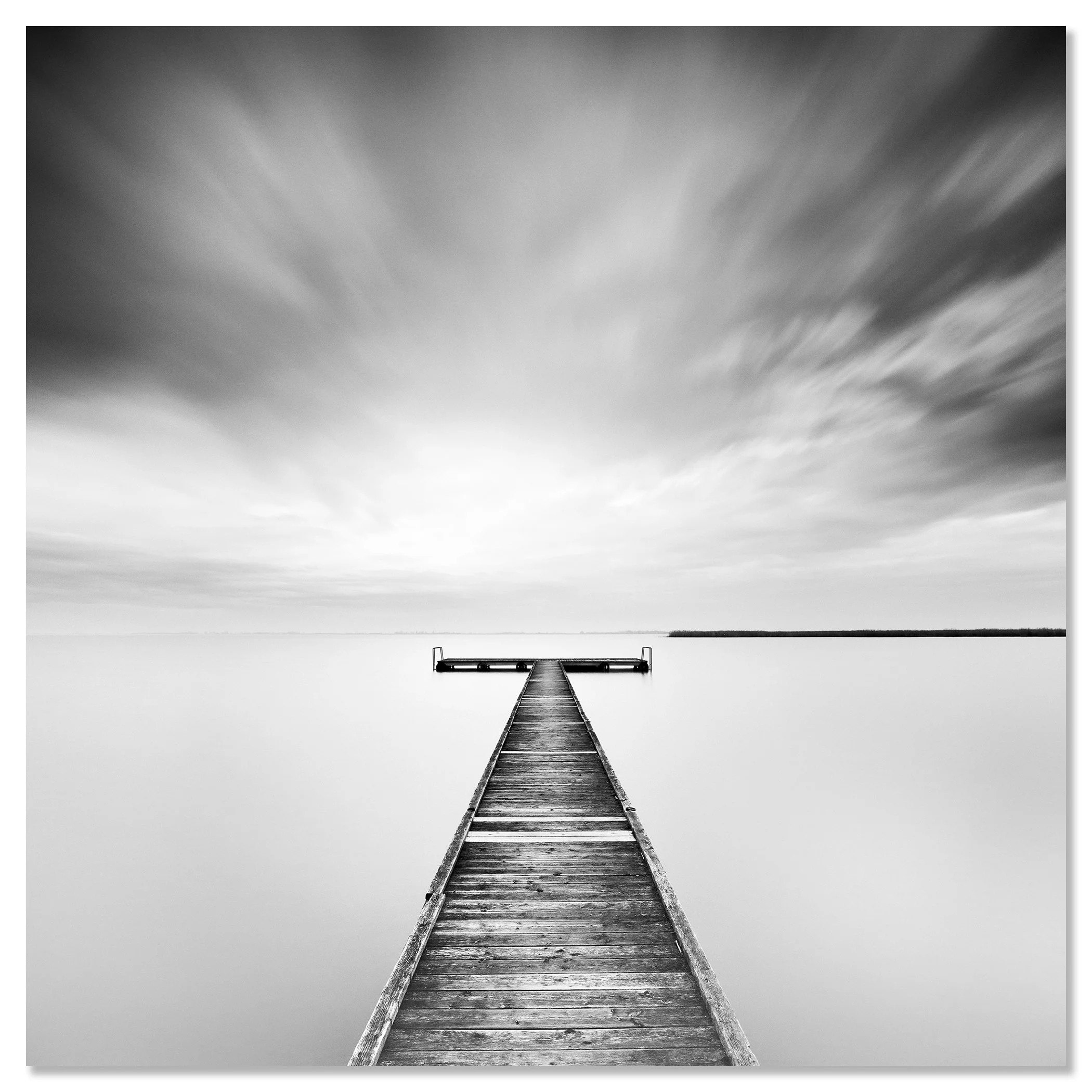 Winter Storm mounted frameless on aluminium Dibond, featuring a wooden jetty on Lake Neusiedl by Gerald Berghammer.