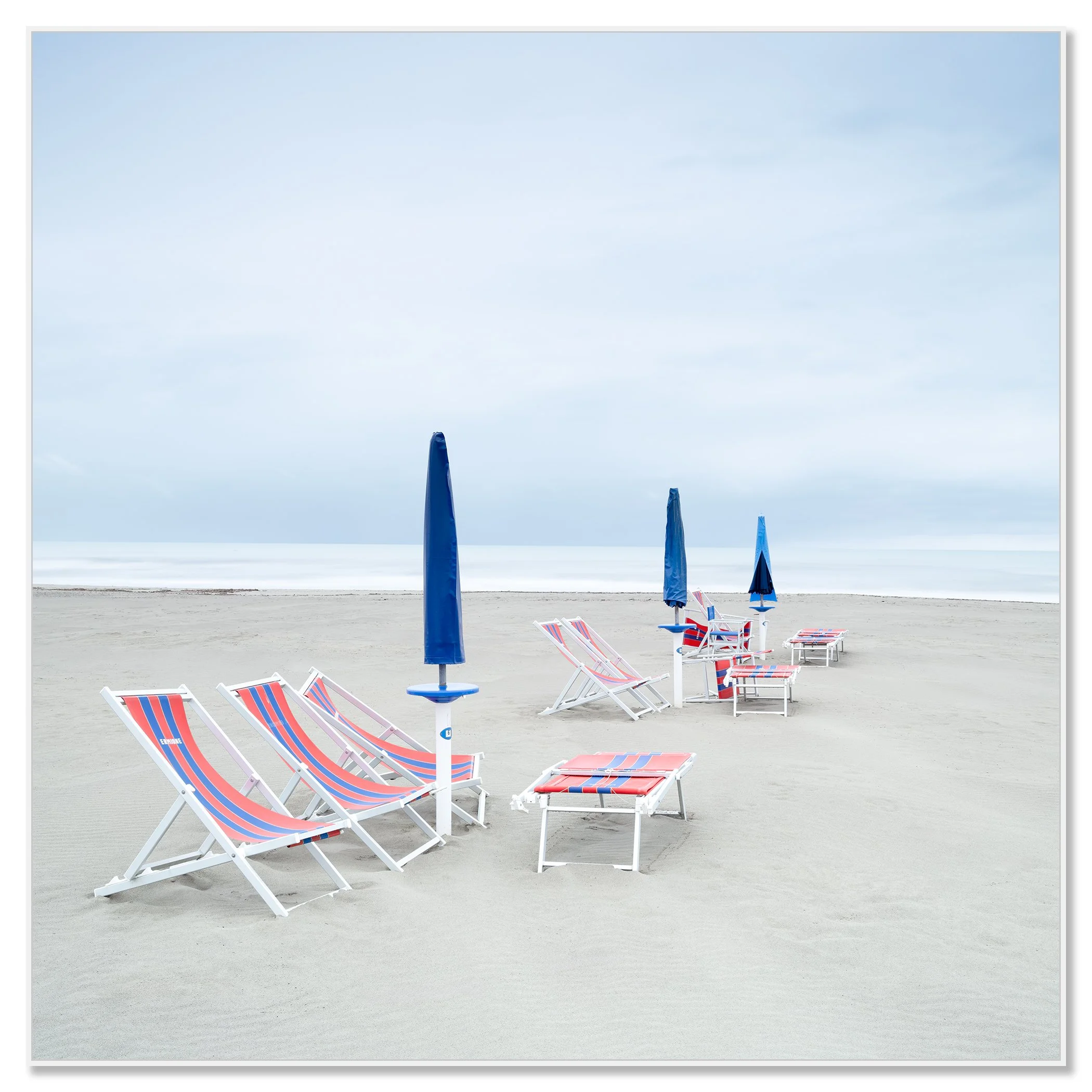 Sun Loungers on the Beach, Study 2 – colour photograph in a white aluminium ArtBox frame.
