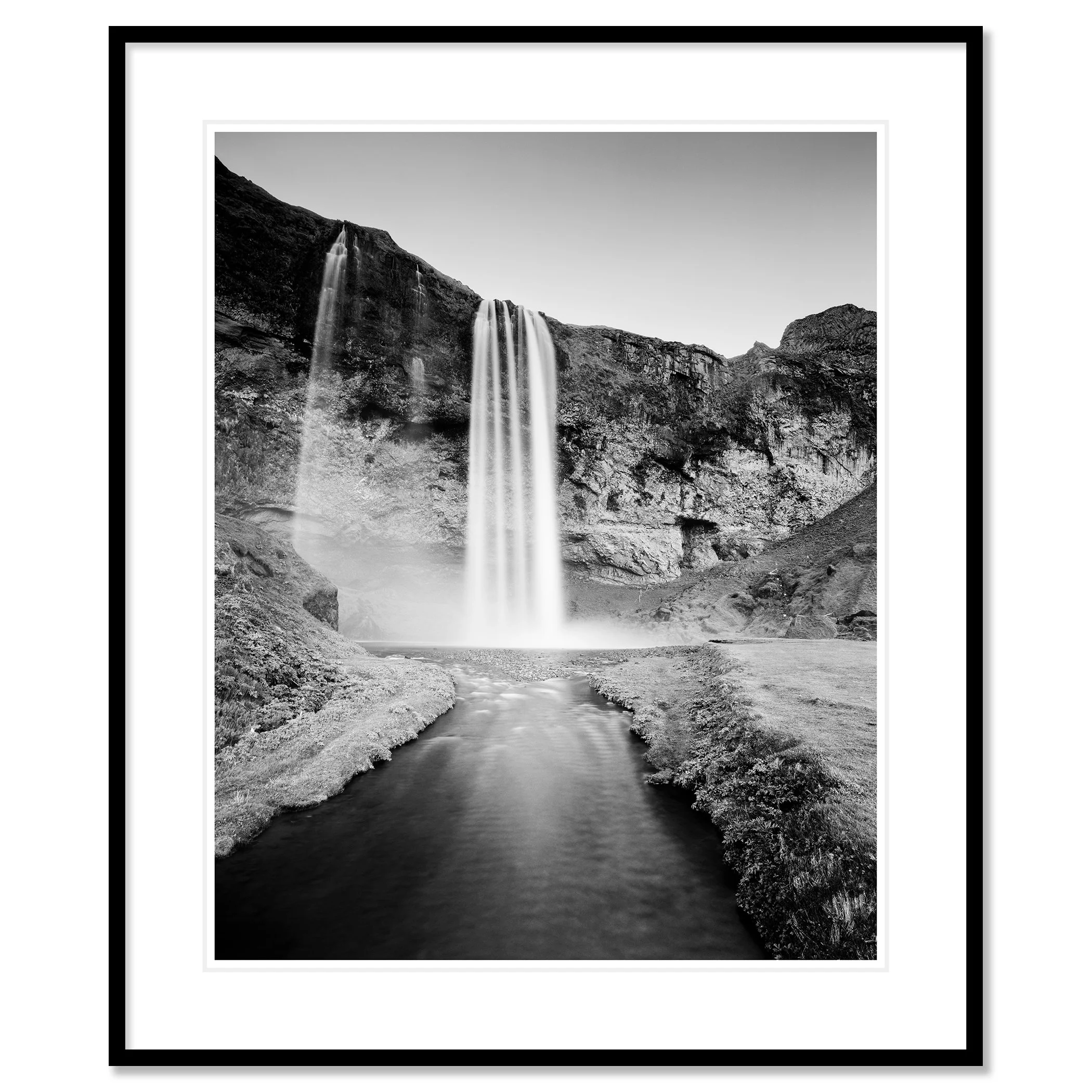 Seljalandsfoss Study 1 displayed as an archival pigment print in a white aluminium frame with white mount by Gerald Berghammer.