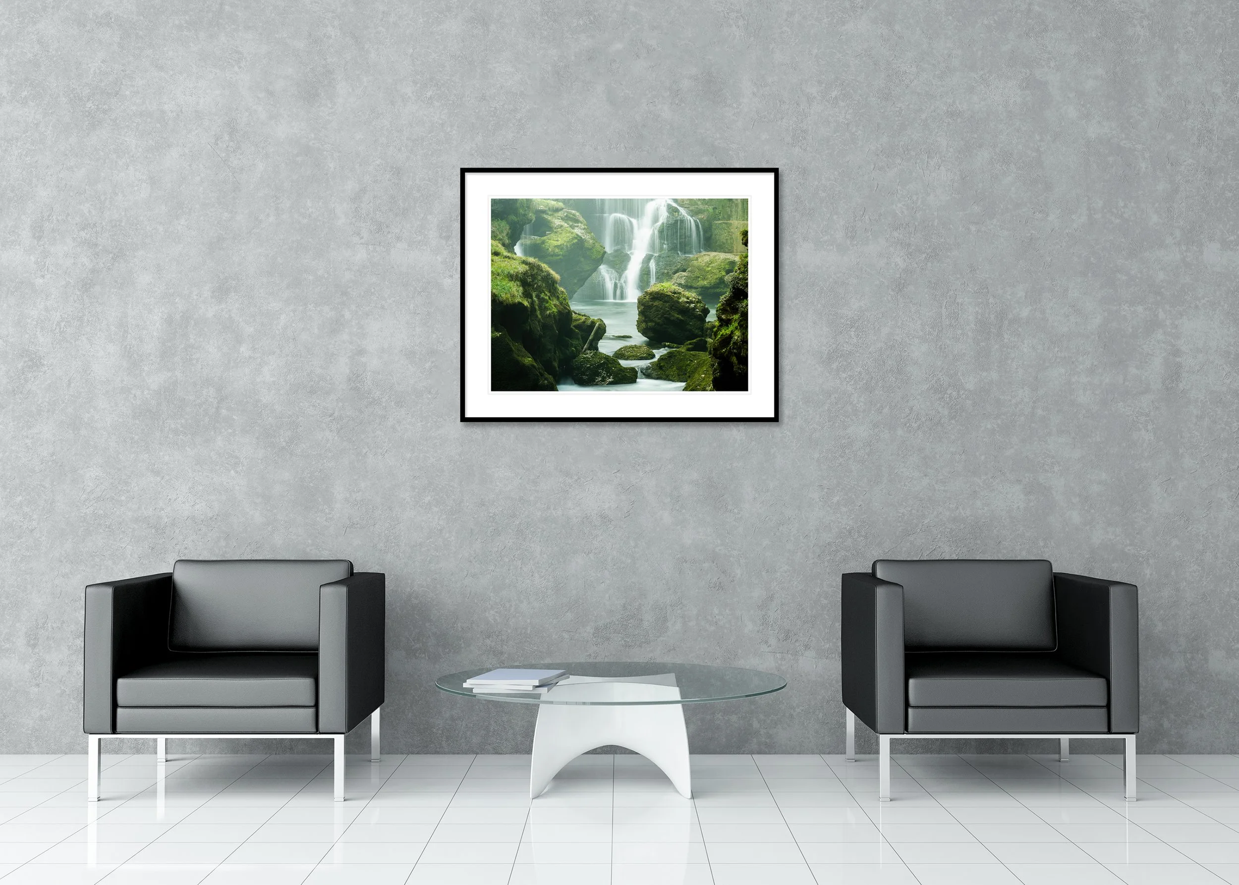 Moss-Covered Waterfall Study 1 displayed in a modern lounge as an archival pigment print in a black aluminium frame with a white mount by Gerald Berghammer.
