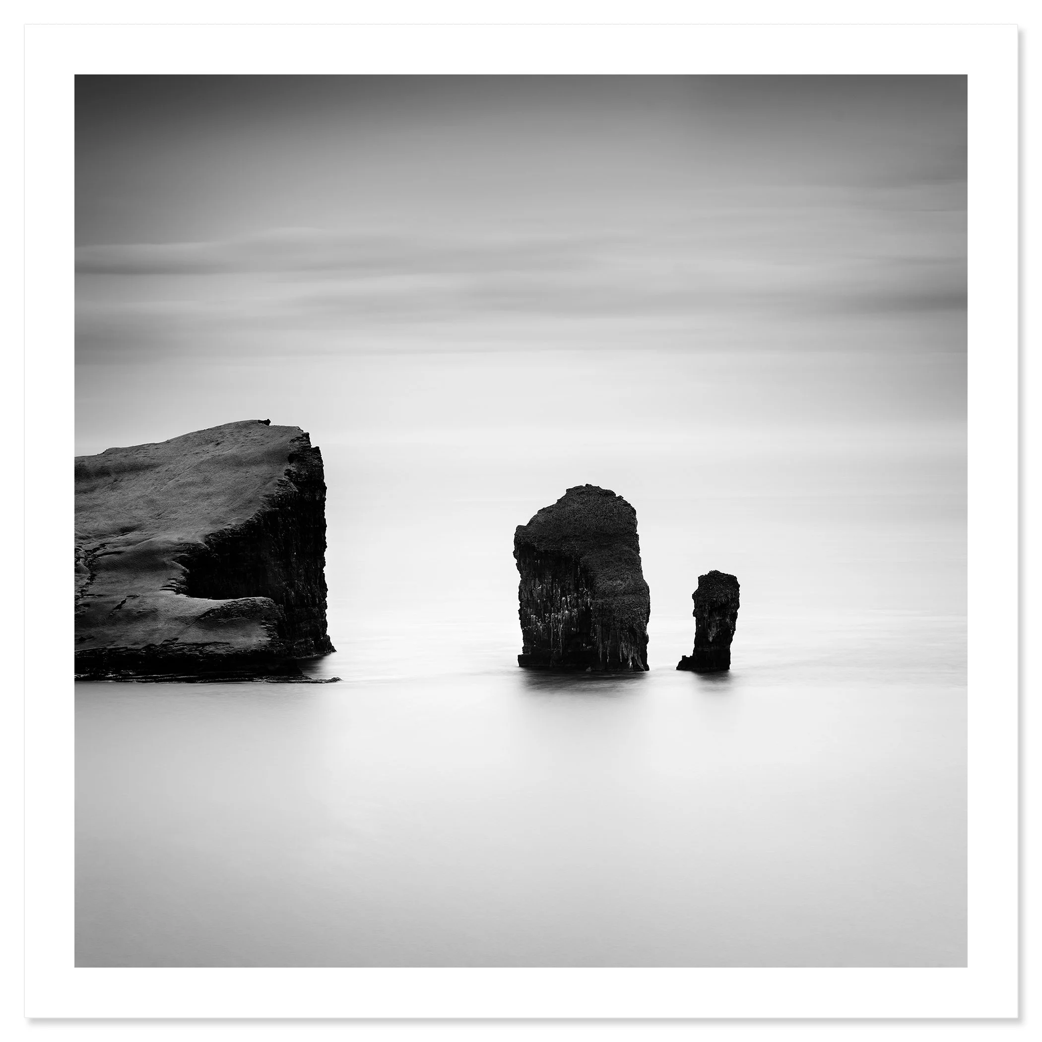 North Atlantic Basalt Study 1 – Faroe Islands, black-and-white fine art print on paper with a white border by Gerald Berghammer.