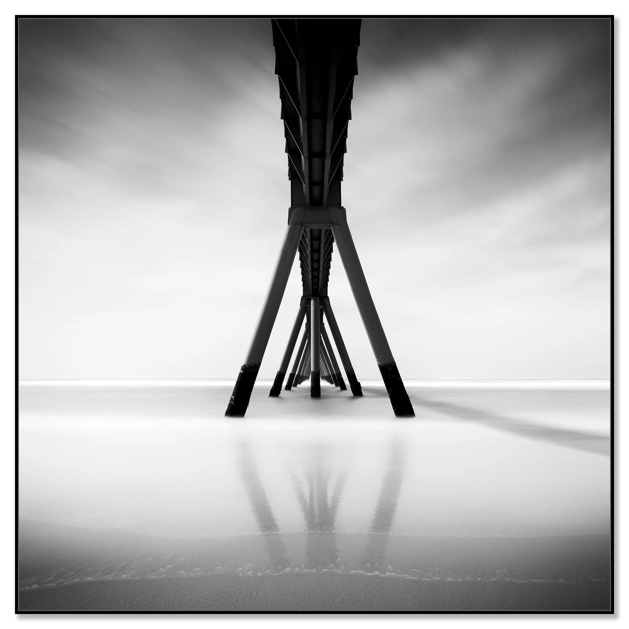 Wharf de la Salie pier on sandy beach in France, minimalist black-and-white fine art photograph of a coastal seascape – framed ArtBox black