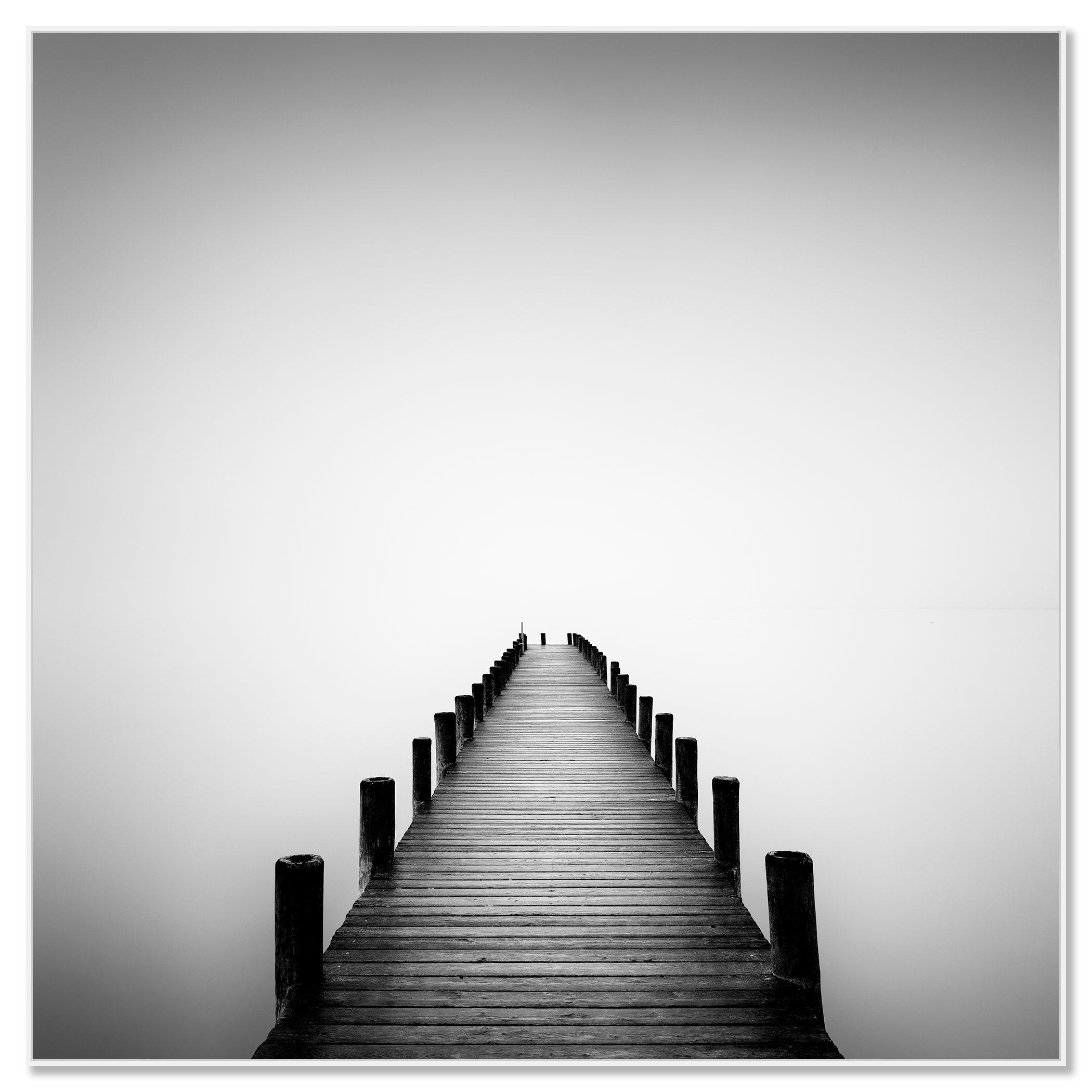 Pier on Misty Lake Study 1 – Austria, black-and-white photograph in a white aluminium ArtBox frame
