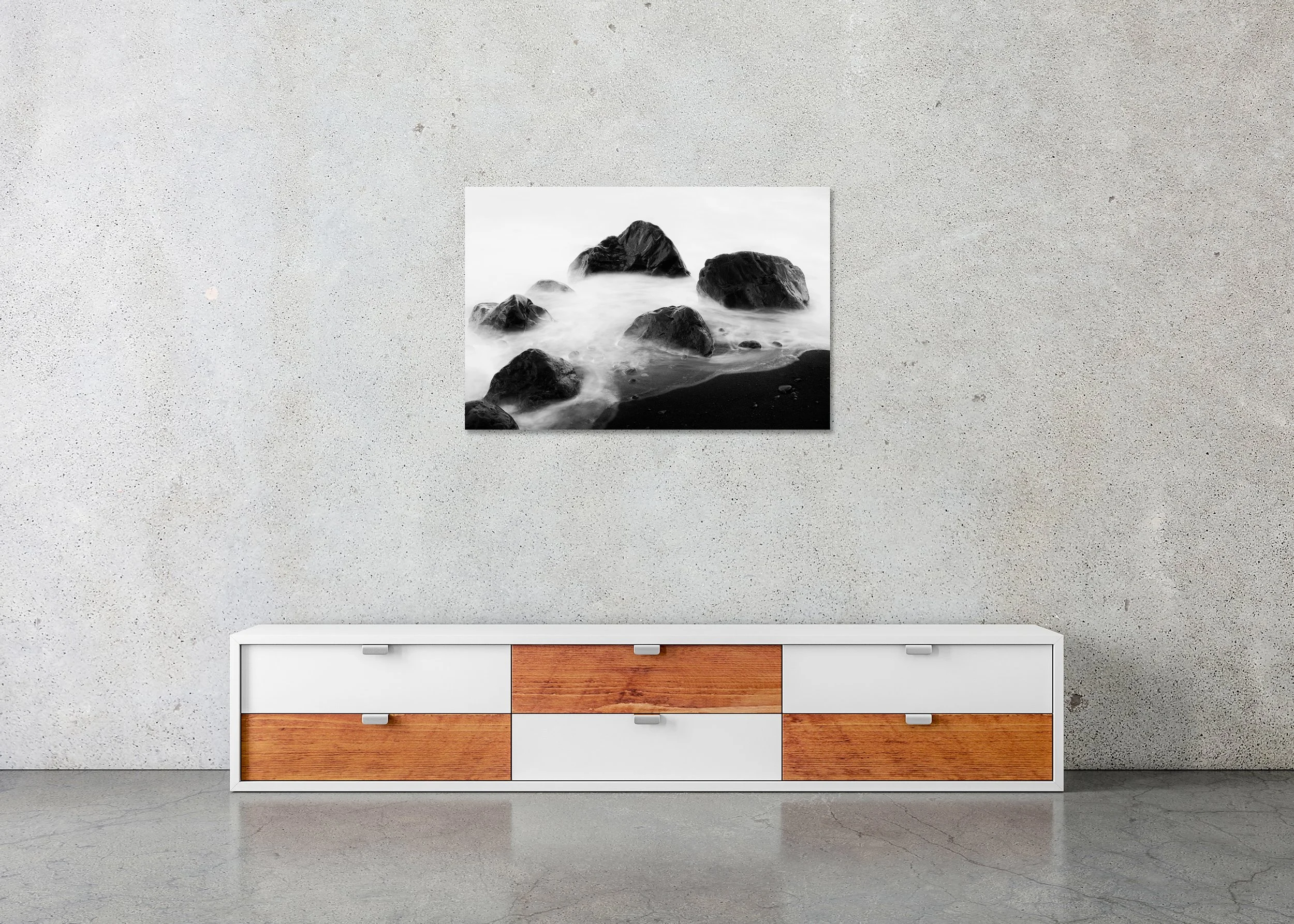 Black Rocks and a Few Stones – Spain displayed on a wall as a frameless aluminium Dibond print.
