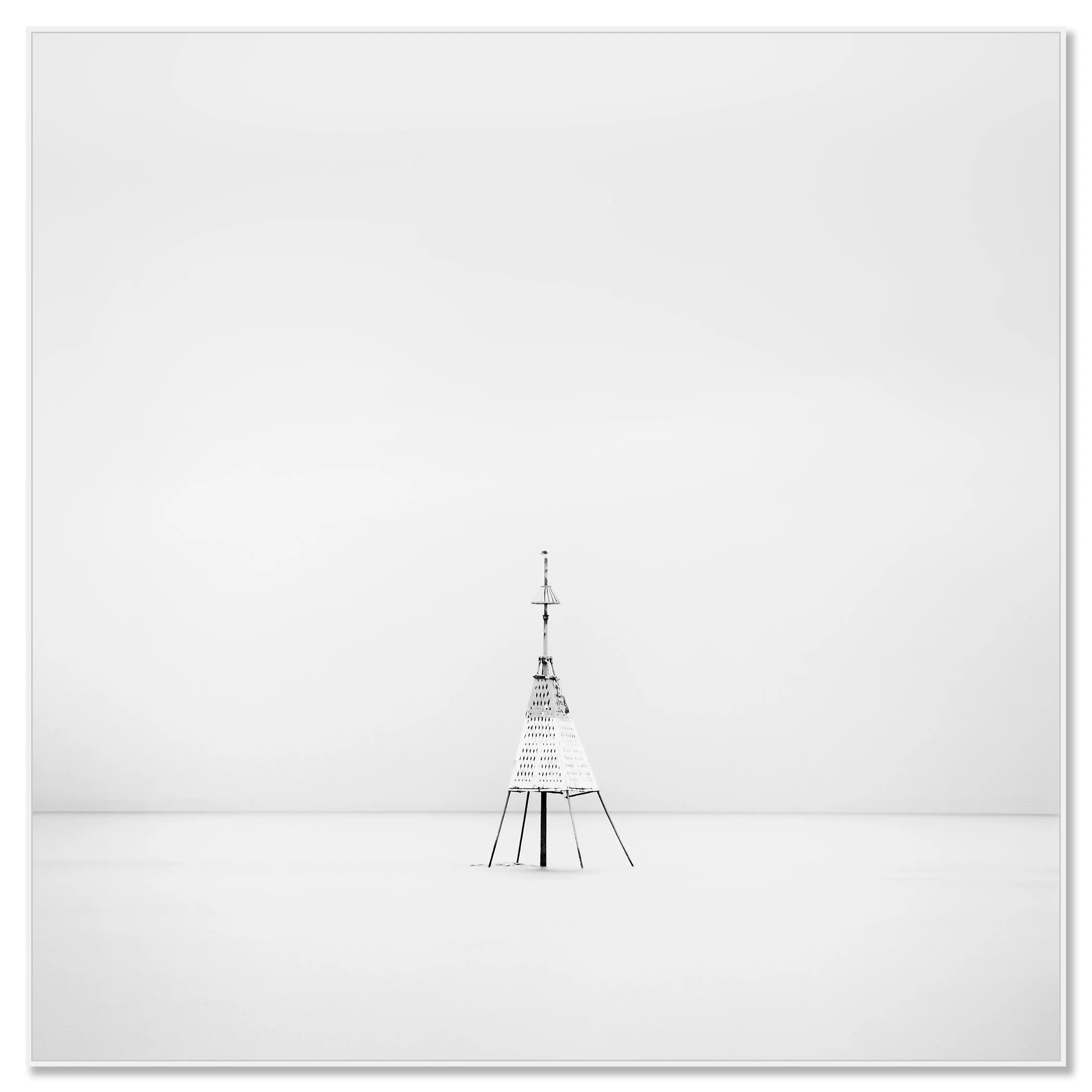Gerald Berghammer - Black and white long exposure seascape photography. Solitary metal structure lighthouse with a conical top, standing in the Ocean. Chromaluxe framed white
