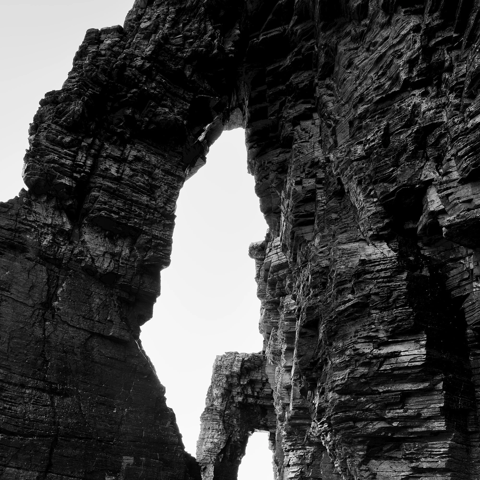 Detail of Arches on Catedrais Beach Study 4 showing the towering natural sea arch and textured cliffs at Praia das Catedrais, Galicia.