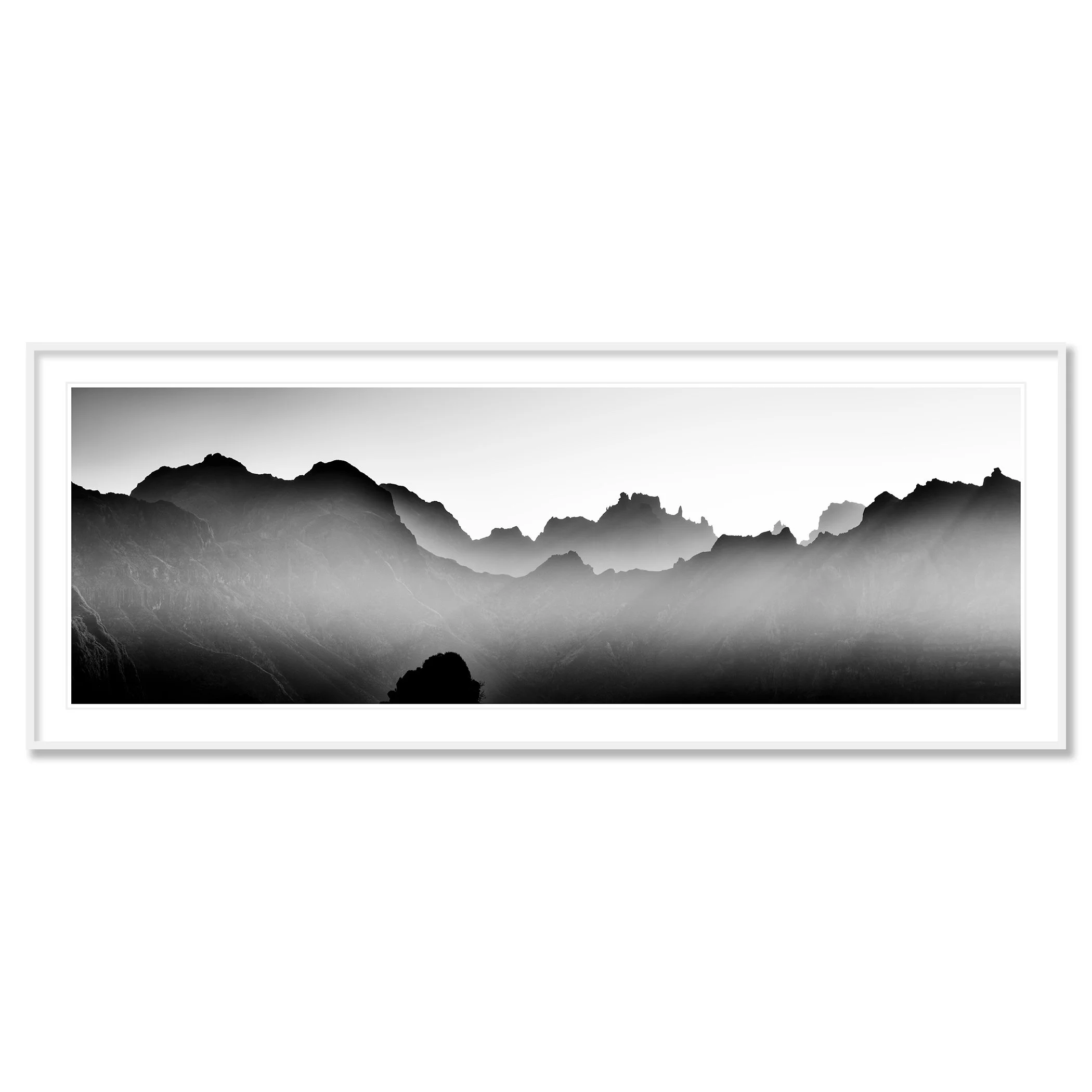 Mountains in Shadow with Morning Light by Gerald Berghammer in a white aluminium frame with a white mount.
