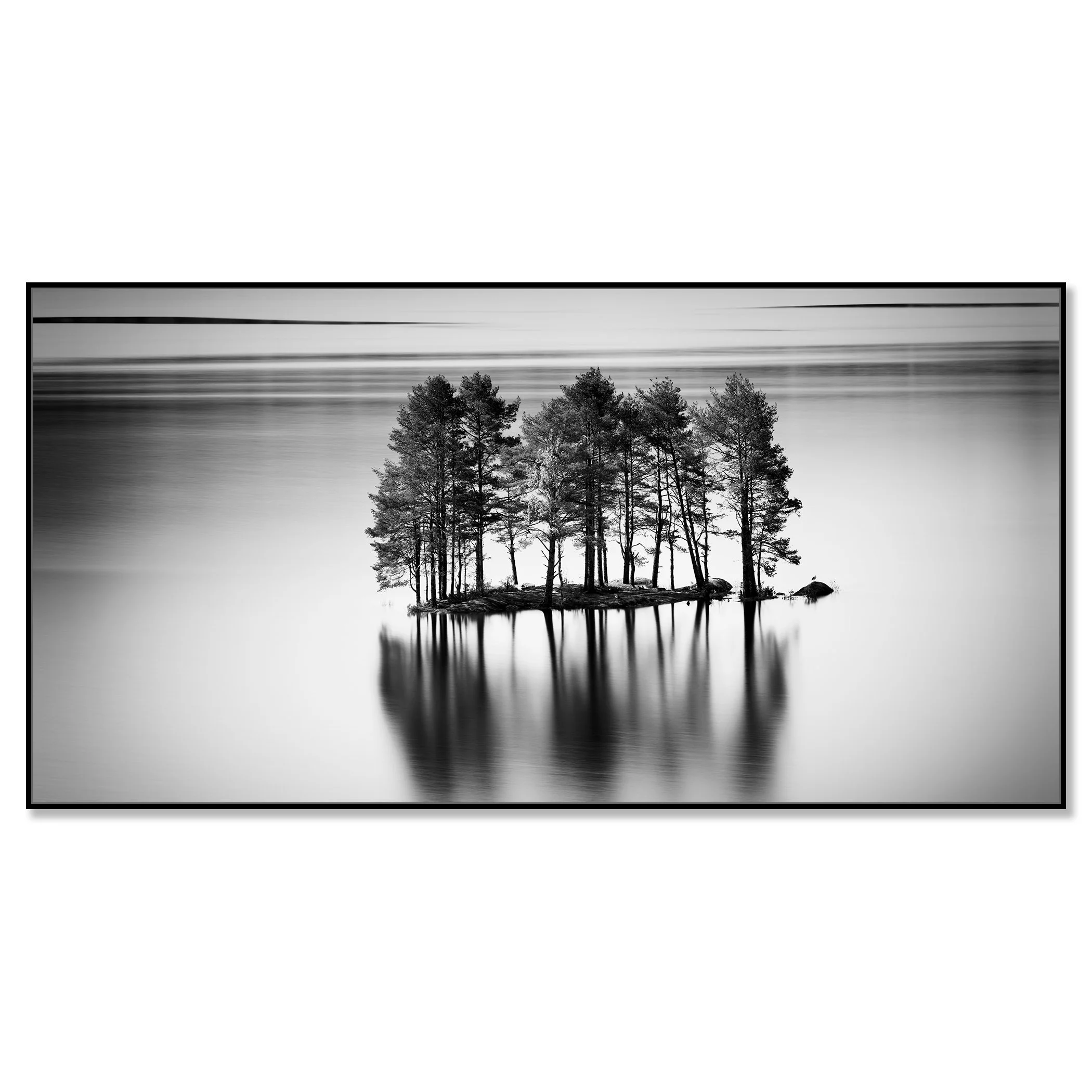 Monochrome fine art image of trees standing on a small island with soft water reflections – framed ArtBox black