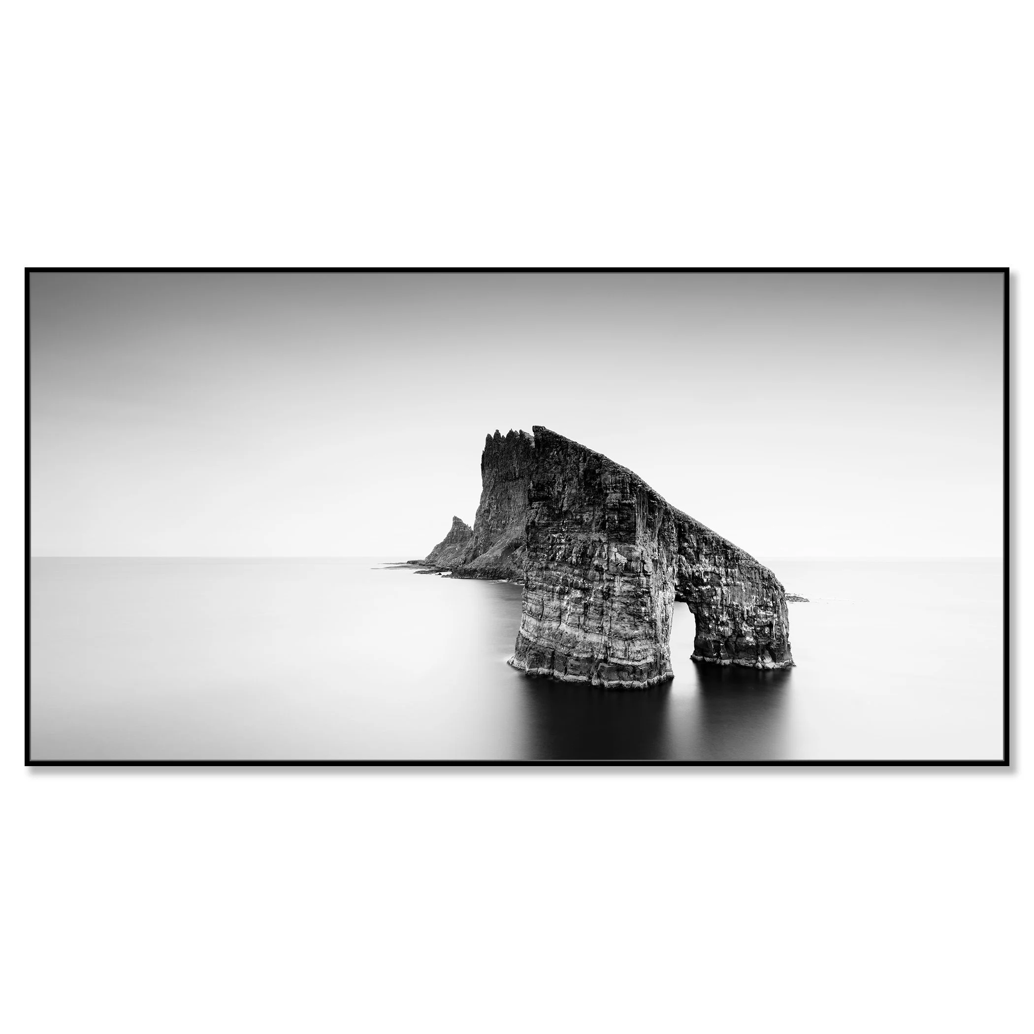 Drangarnir Sea Arch Panorama, Faroe Islands, black-and-white Dibond print in a black aluminium ArtBox frame by Gerald Berghammer.