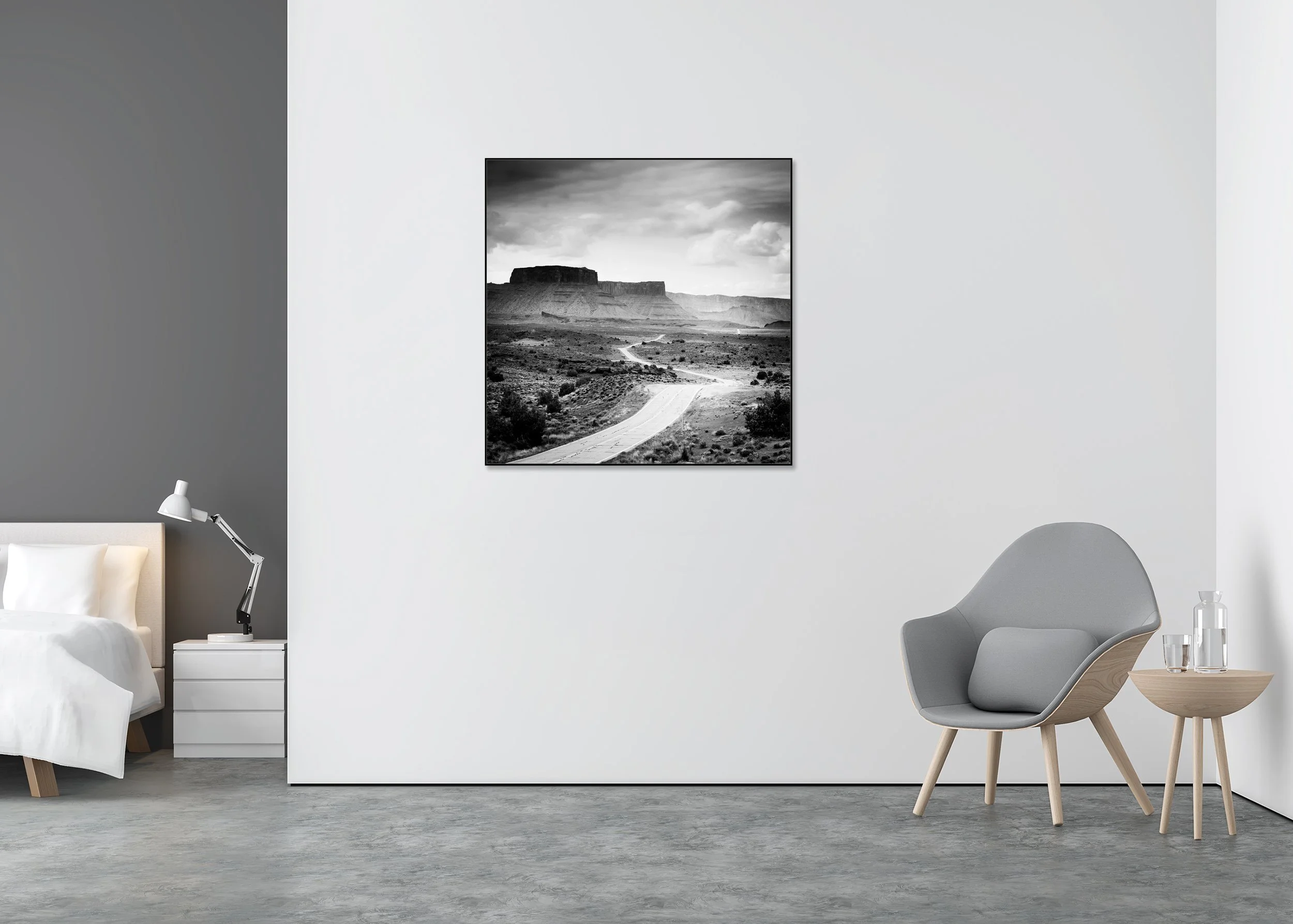 Road to Nowhere – Utah, USA, black-and-white photograph on Dibond in an aluminium ArtBox displayed in a minimalist bedroom. Photo by Gerald Berghammer.
