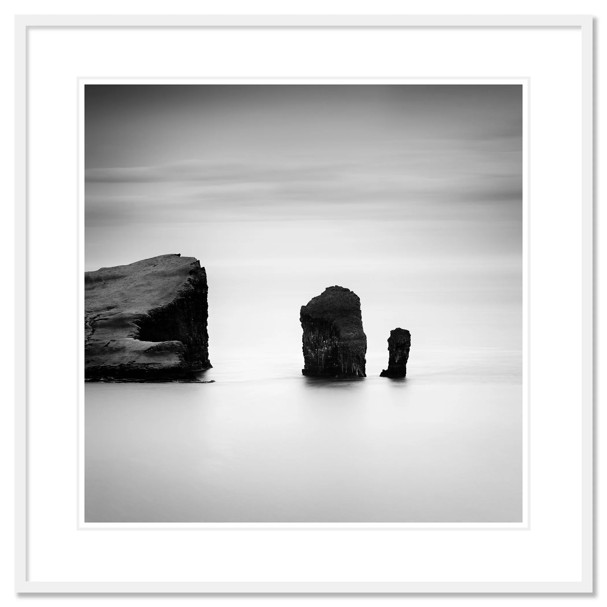 North Atlantic Basalt Study 1 – Faroe Islands, black-and-white fine art print in a white aluminium frame with a white mount by Gerald Berghammer.