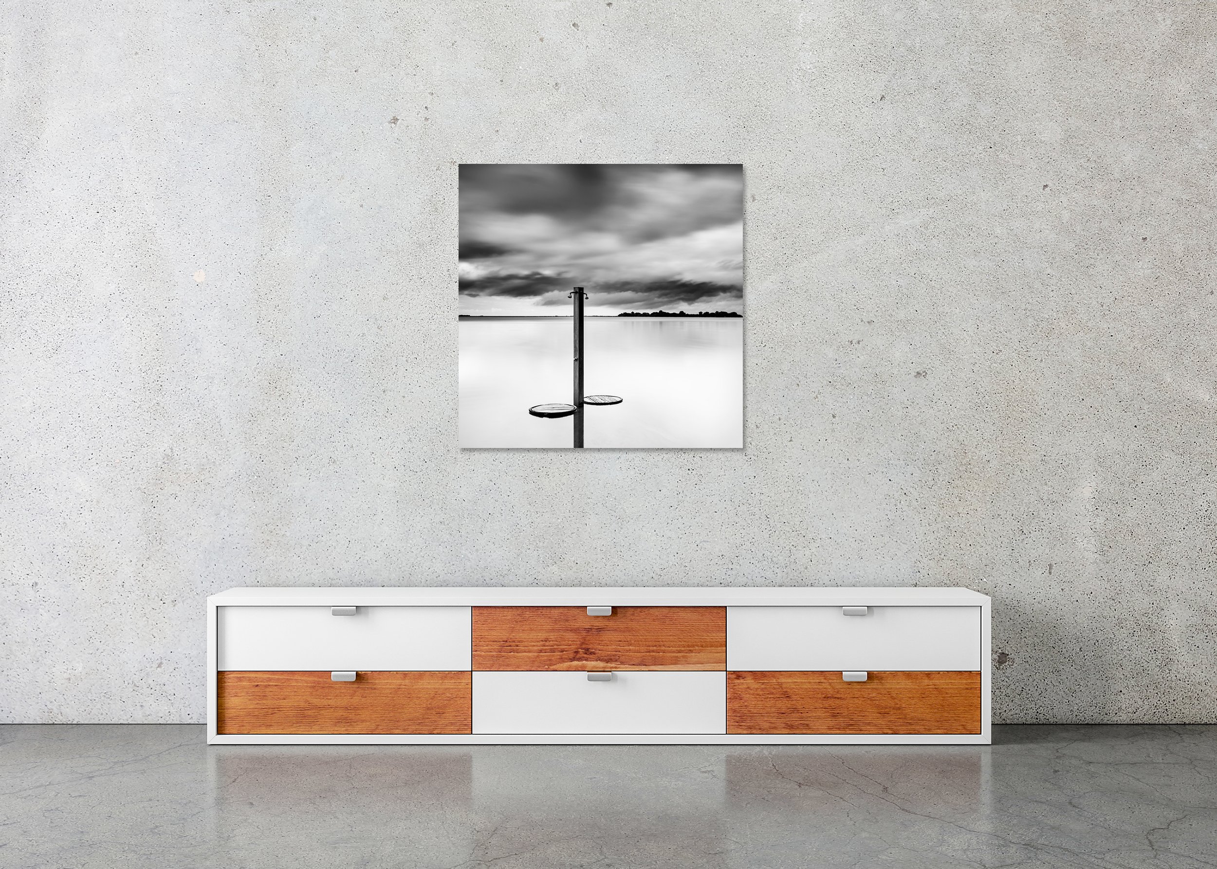 Beach shower in shallow water beneath a moody sky, fine art black-and-white photo print mounted to Dibond, frameless.