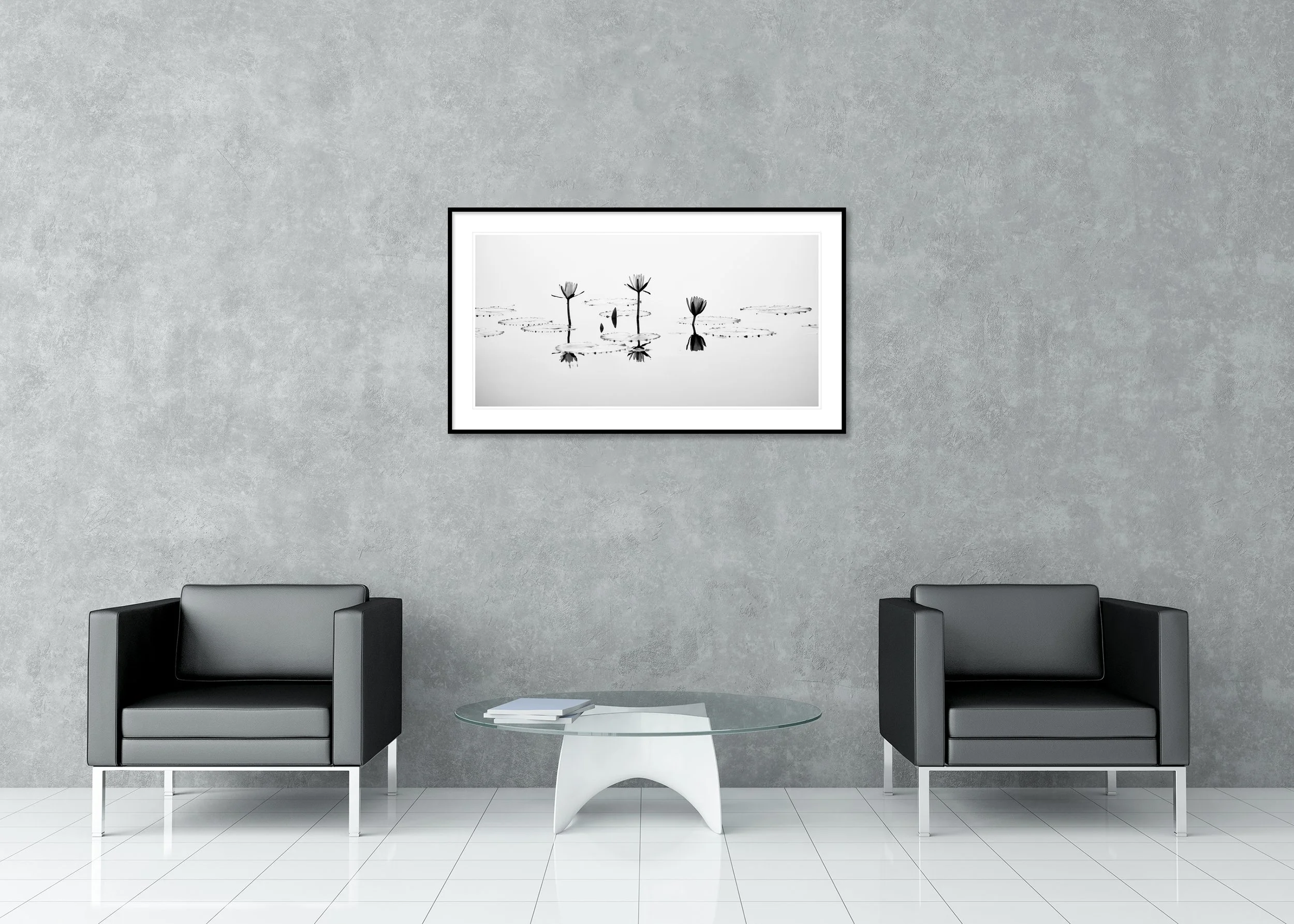 Black and white photograph of blooming lotus flowers on a quiet pond, archival pigment print in a classic frame with a mount