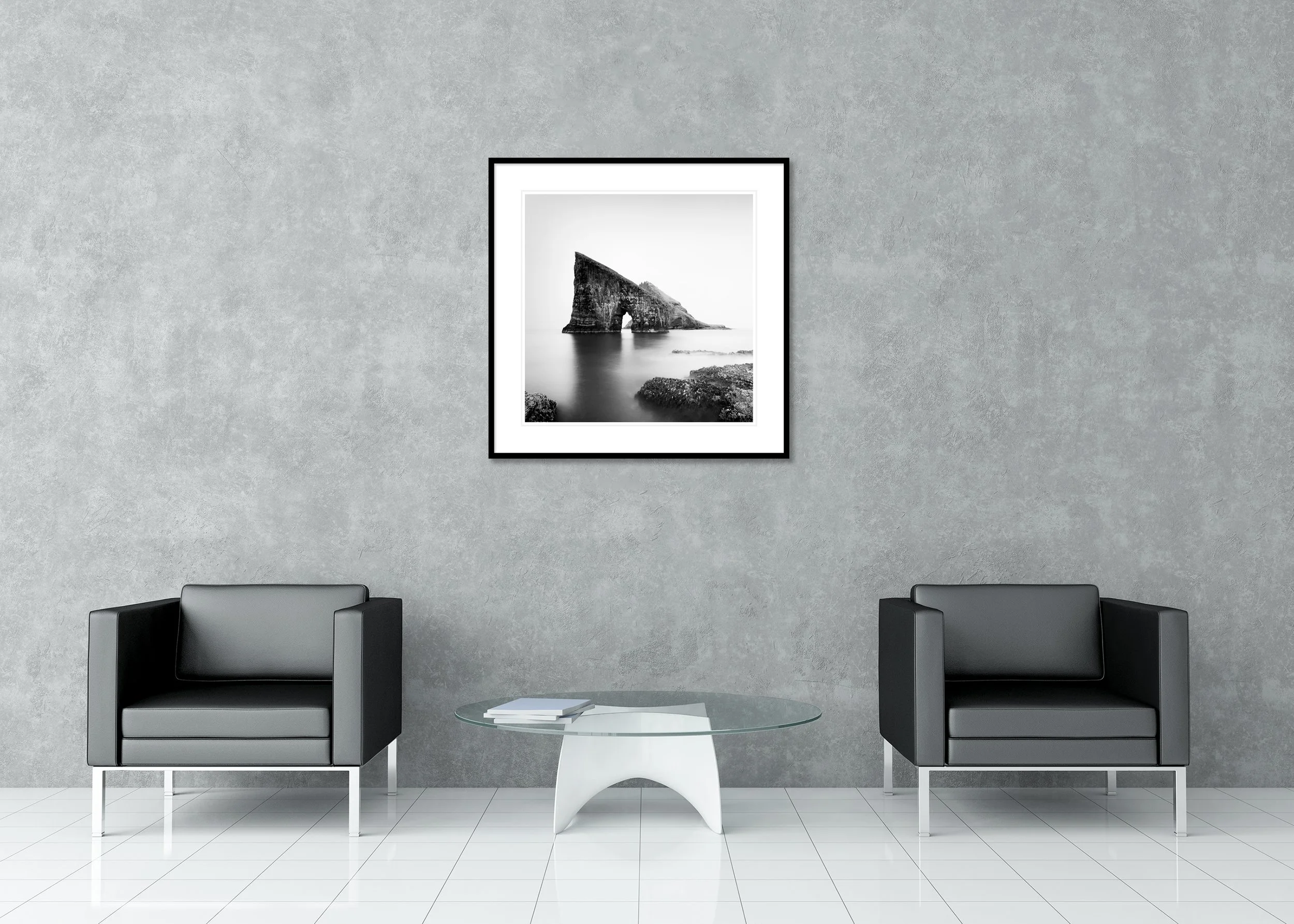 Drangarnir Sea Stacks Study 2 by Gerald Berghammer displayed in a contemporary interior in a black aluminium frame with a white mount.
