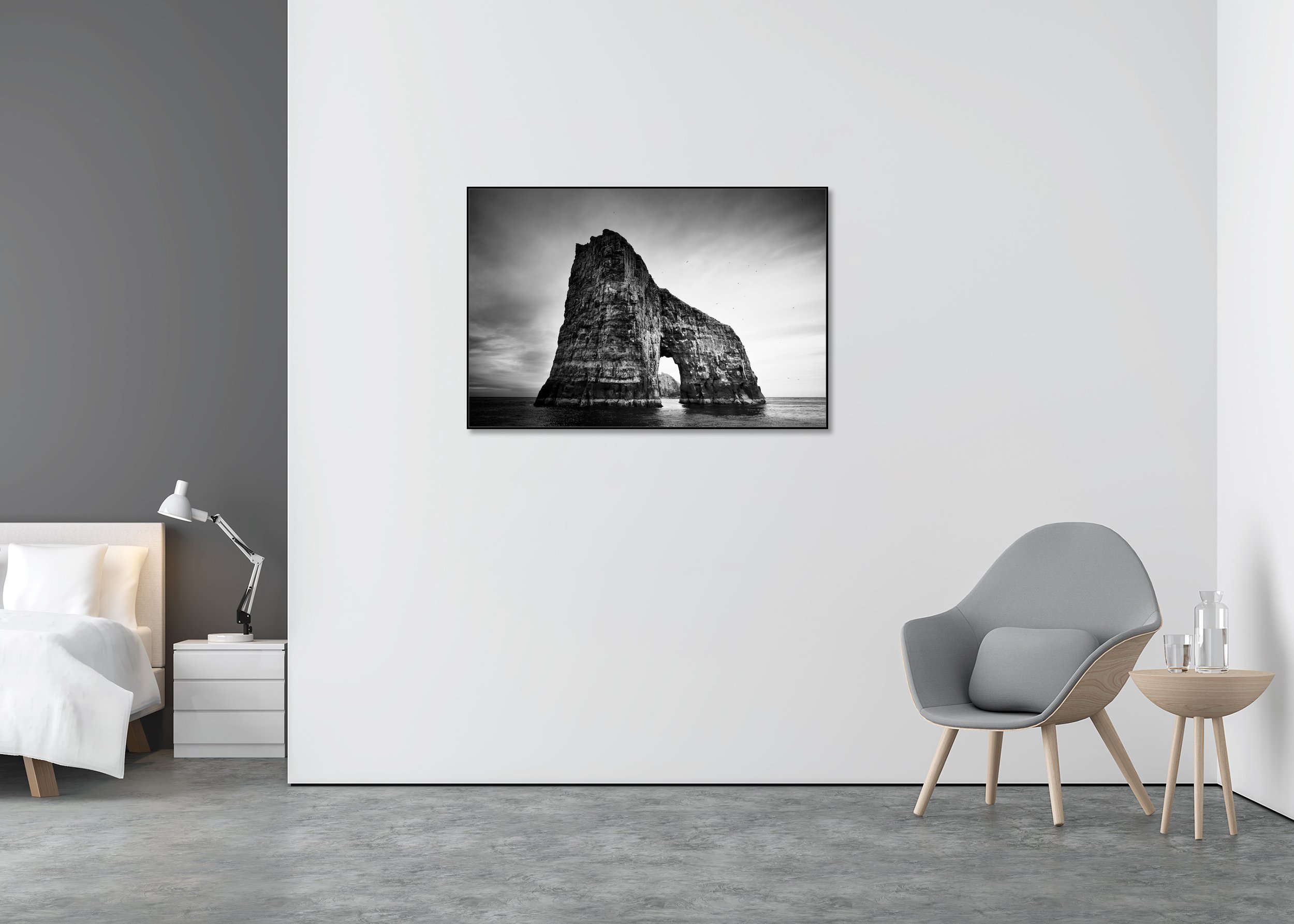 Monochrome seascape photo print of a dramatic rock arch rising from the ocean, mounted to Dibond in an aluminium ArtBox