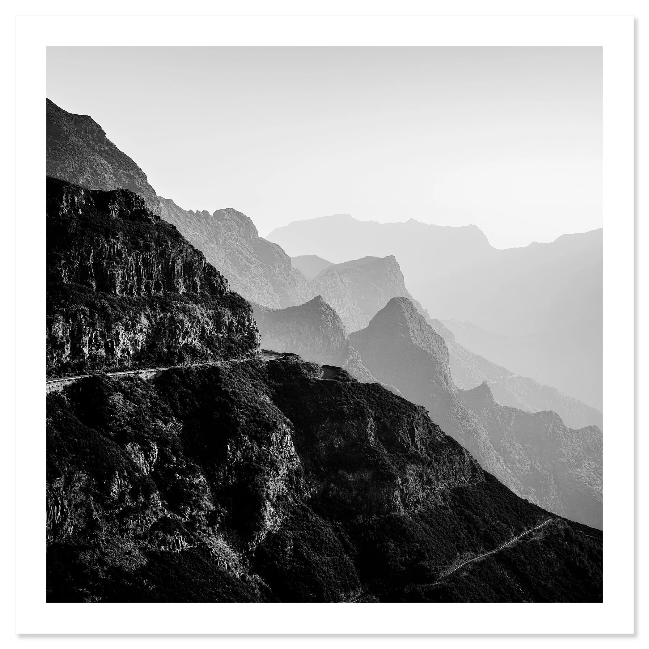 Madeira Peaks Study 1 by Gerald Berghammer, black-and-white fine art print with white border showing misty mountain ridges in Madeira.