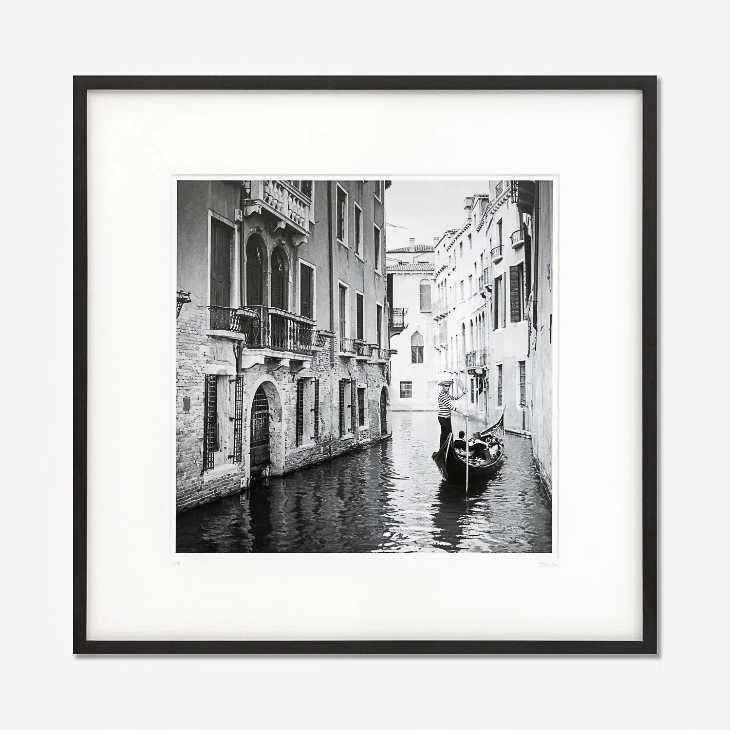 Gondoliere Study 1 by Gerald Berghammer, framed black-and-white photograph of a gondolier navigating a narrow canal in Venice, Italy.