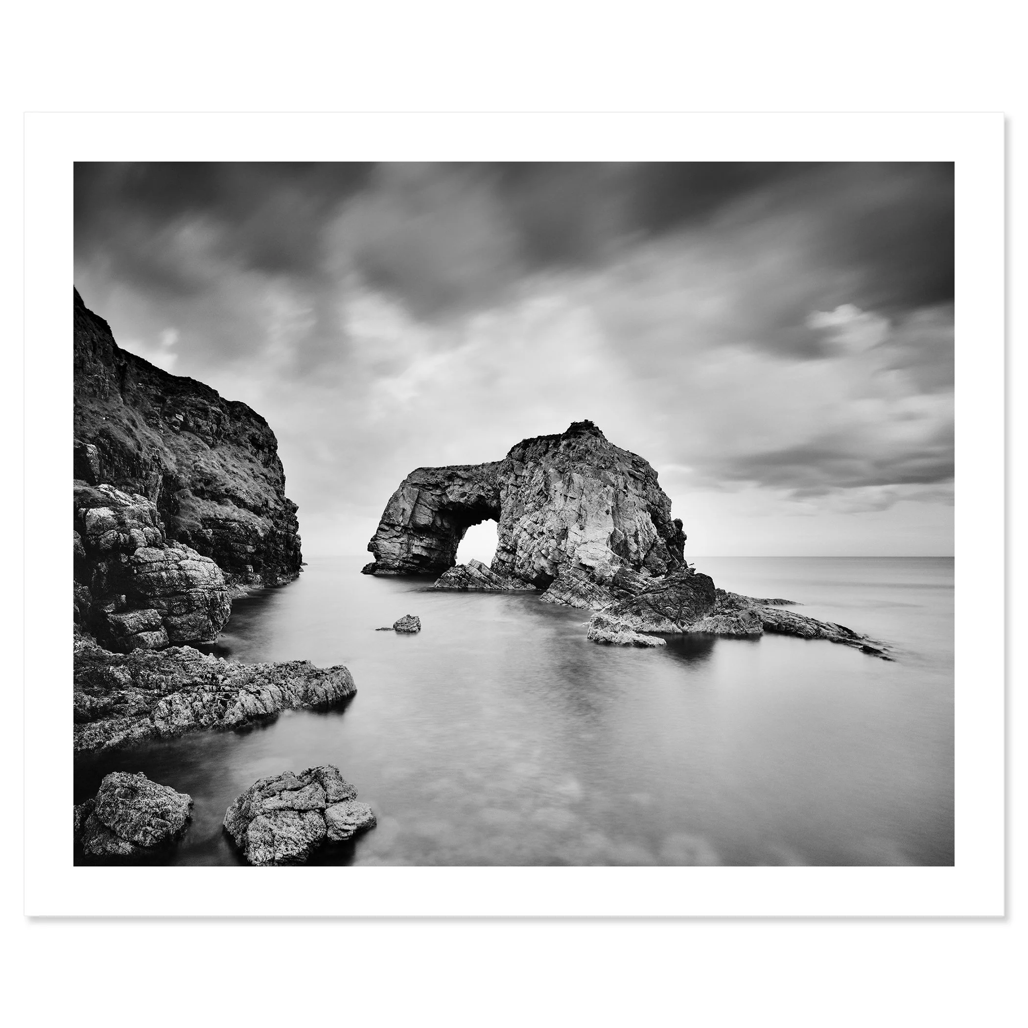 Great Pollet Sea Arch Study 3 shown as an archival black-and-white fine art print with white border by Gerald Berghammer.