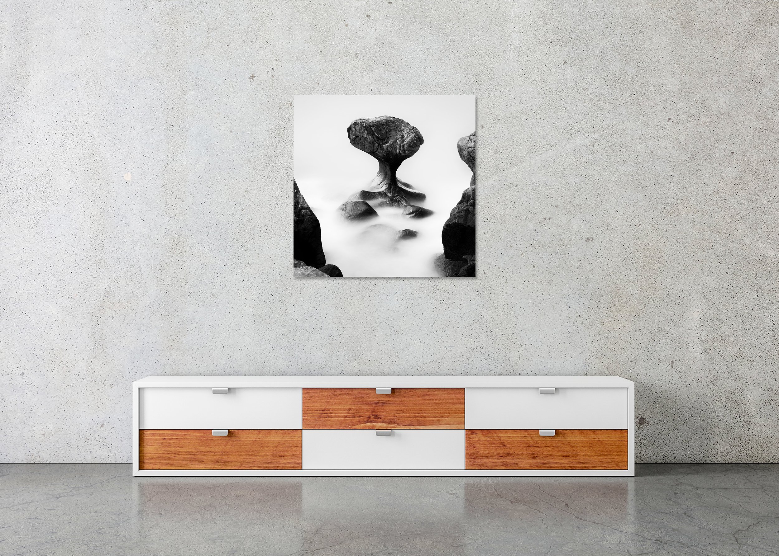 Surreal black and white photo print of a coastal rock formation in soft sea mist, mounted to Dibond, frameless