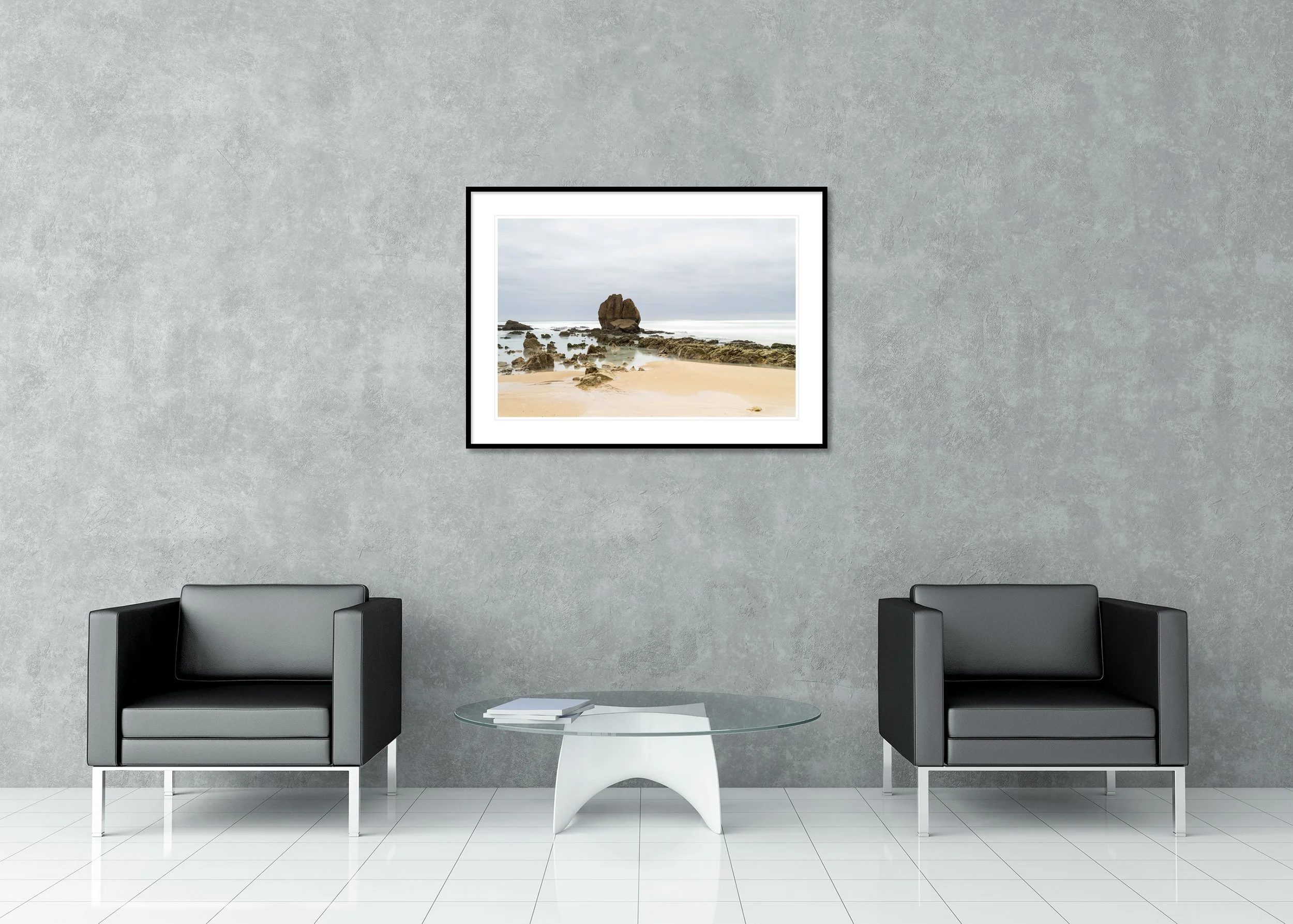 Rocks on the Shore, Study 3 – France, archival pigment print in a black aluminium frame with a white mount in a modern lounge.