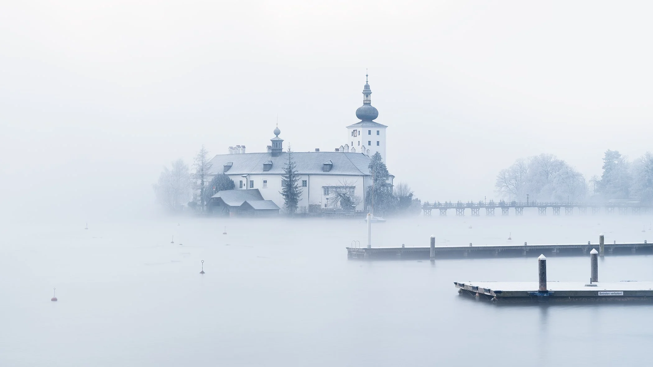 Seeschloss Ort rising through winter mist on Lake Traunsee in Gmunden, Austria. Photo by Gerald Berghammer.