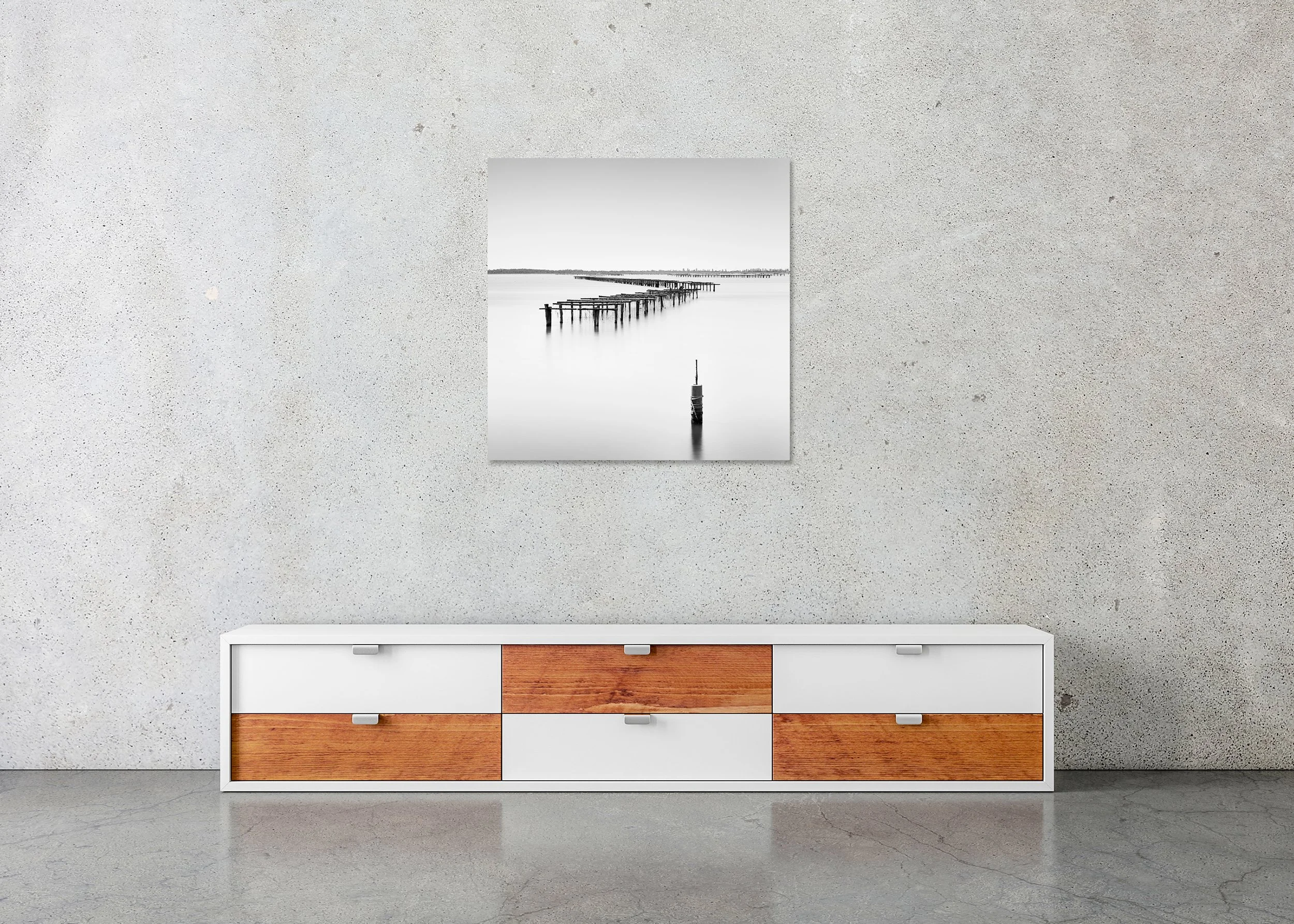 Aquaculture Structures Study 4 displayed above a low cabinet as a frameless black-and-white aluminium Dibond print by Gerald Berghammer.