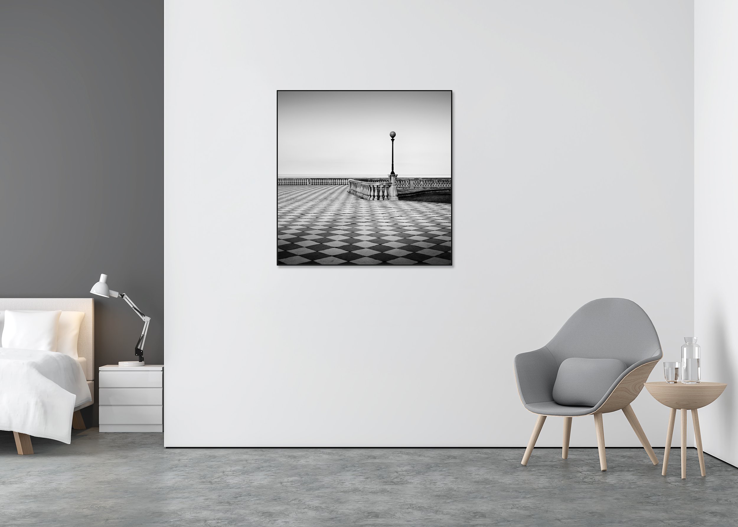 Black-and-white photo print of an empty Tuscan seafront promenade with geometric tiles, balustrade and calm sea beyond, mounted to Dibond in an aluminium ArtBox.