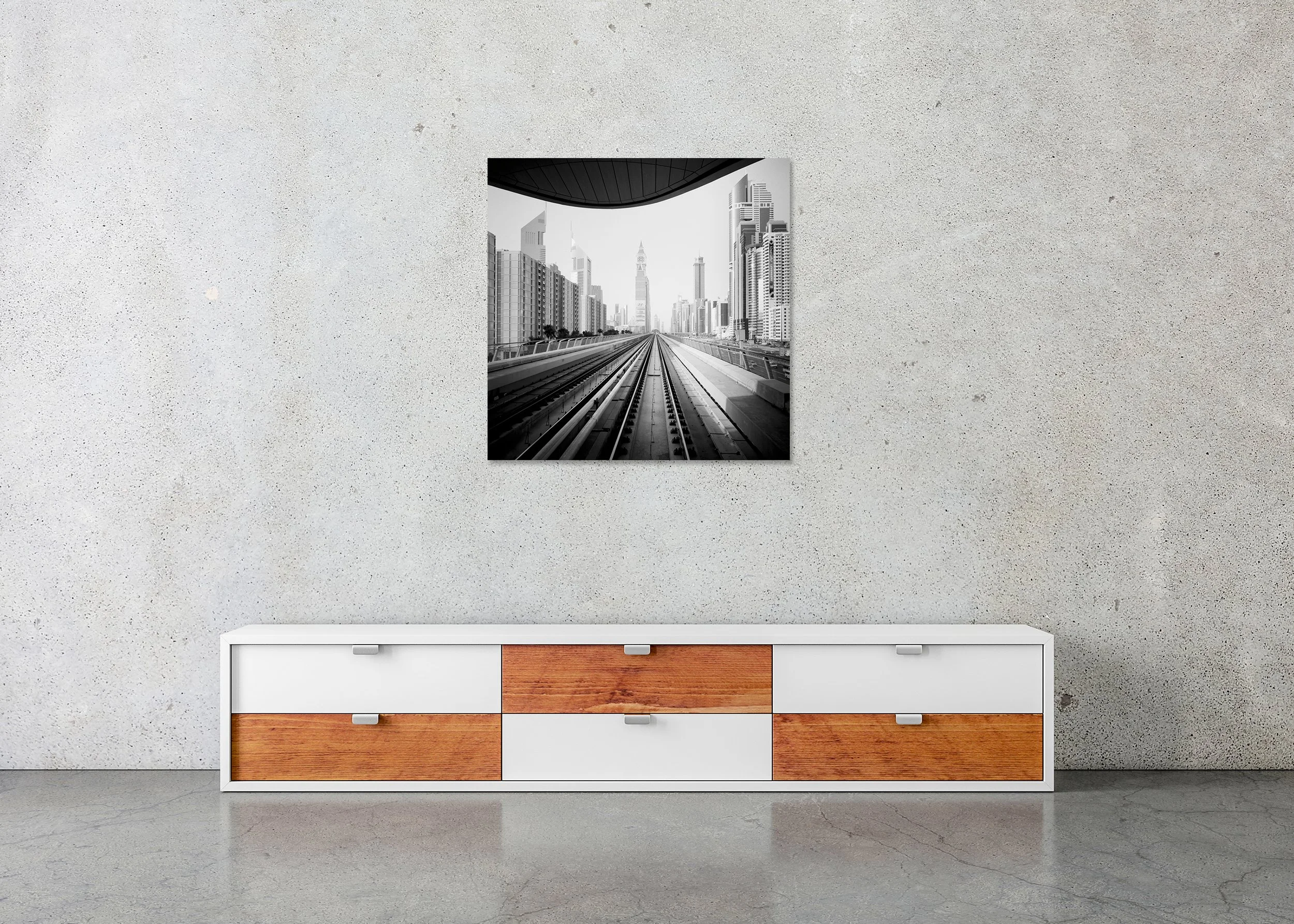 Surreal World displayed in a modern interior as a frameless black-and-white aluminium Dibond print by Gerald Berghammer.